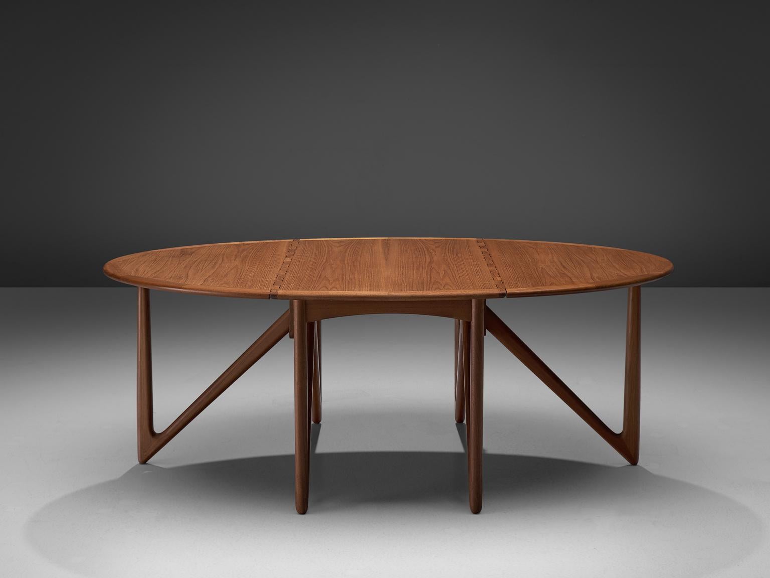 Kurt Ostervig for Jason Mobler modern, oval table in teak, Denmark 1960s.

This rare drop-leaf table shows an unusual, impressive base of six V-shaped legs, made with extraordinary craftsmanship. The clear shape of the oval top nicely contrasts to