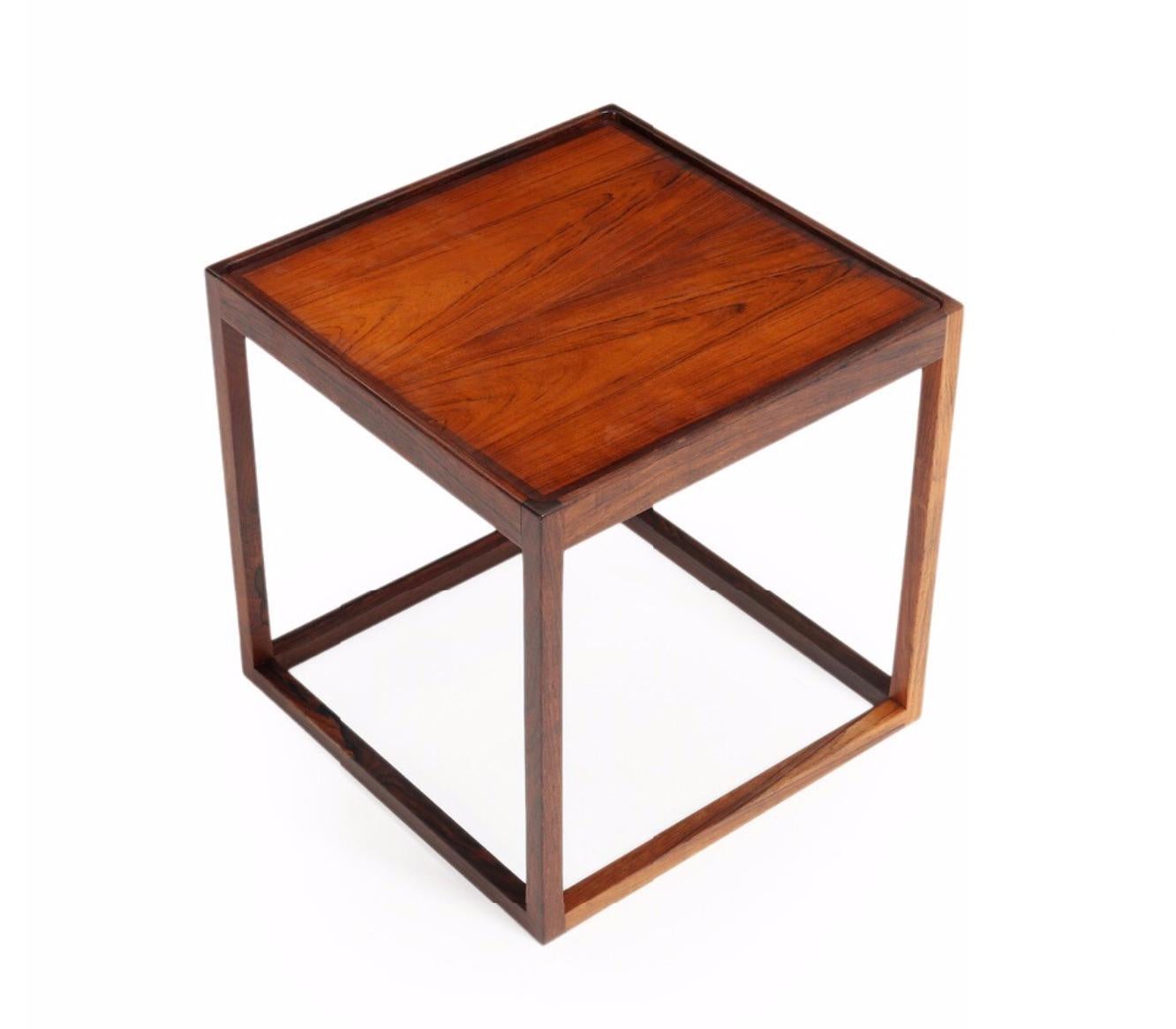 Cube-shaped rosewood side table with reversible top. Manufactured by Jason Møbler, Denmark. Purchased in Denmark. 

Additional images, close-ups and detailed condition report available upon request.


