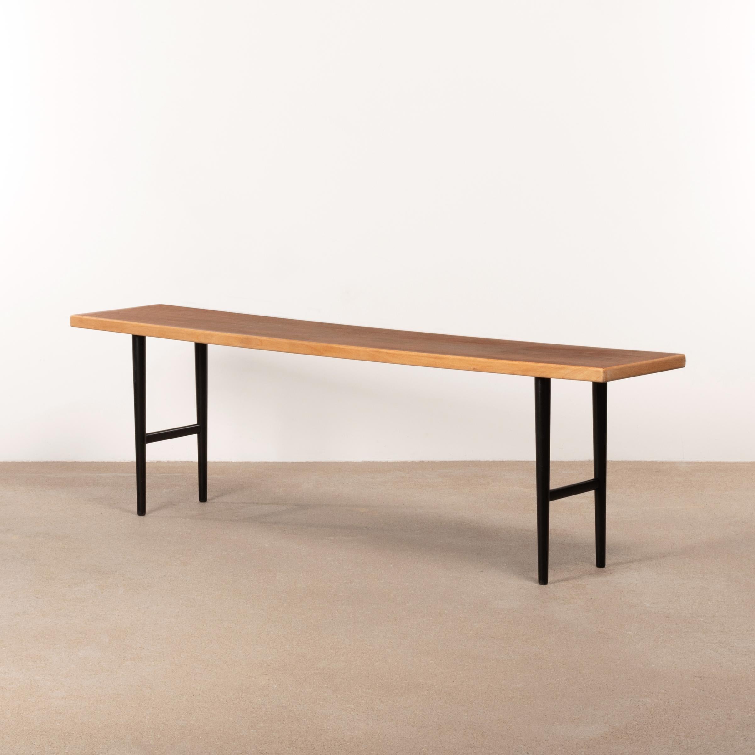 Rarely seen side table / bench by Kurt Østervig for Jason Møbler, Denmark. Brazilian rosewood table top with a solid Beech wood edge and black painted legs all in very good condition with minimal traces of use. CITES certificate / export permit