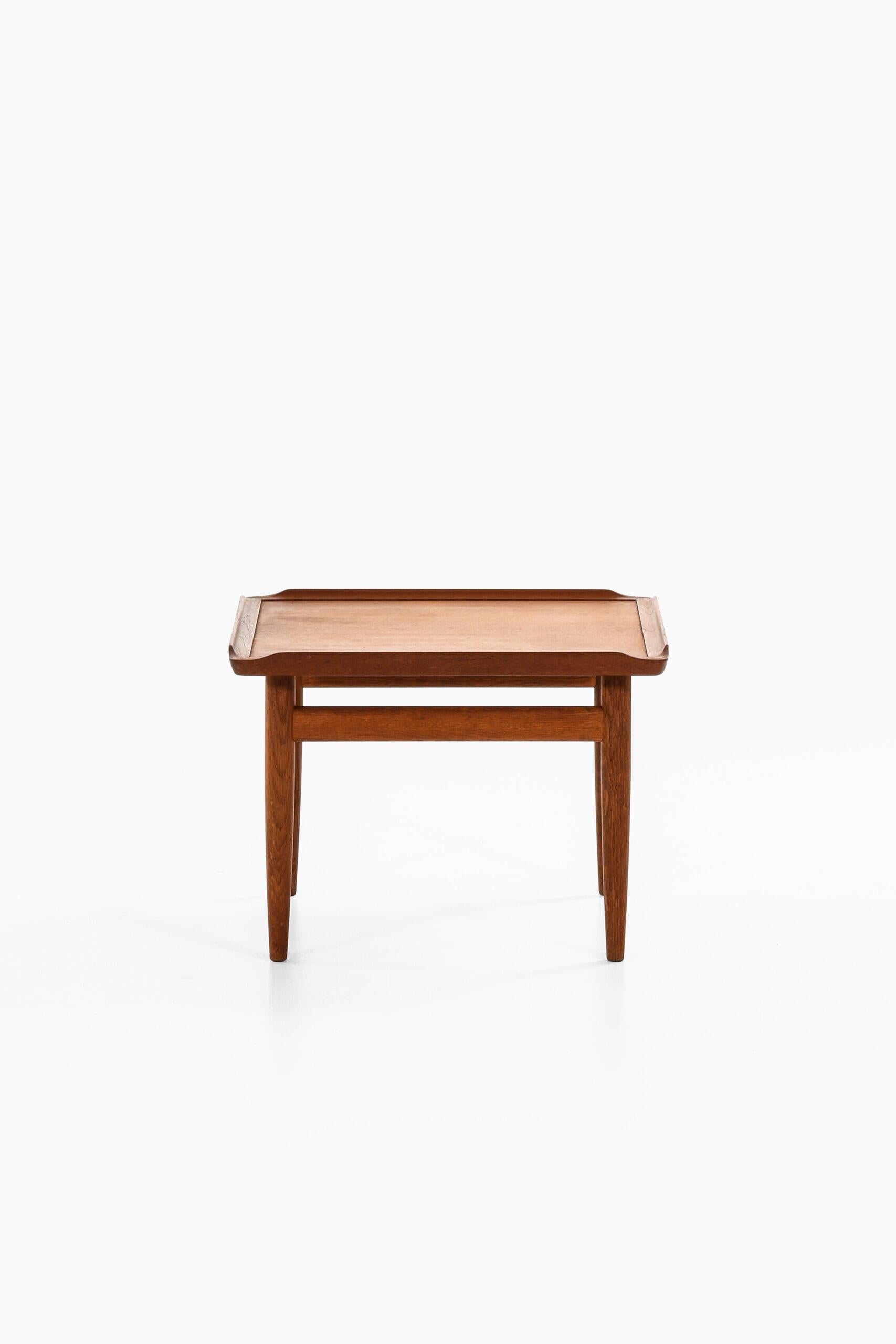 Rare side table designed by Kurt Østervig. Produced by Jason Møbler in Denmark.