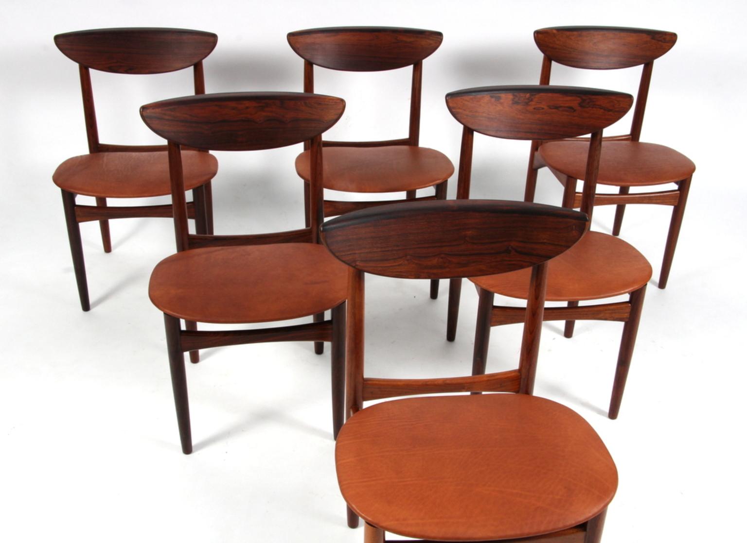 Kurt Østervig six dining chairs made in rosewood.

 New upholstered with cognac aniline leather. 

 