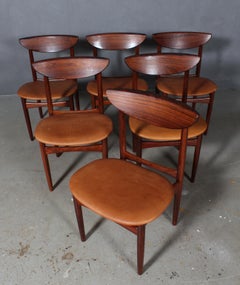 Kurt Østervig:: Sechs Esszimmerstühle aus Palisanderholz und cognacfarbenem Anilinleder