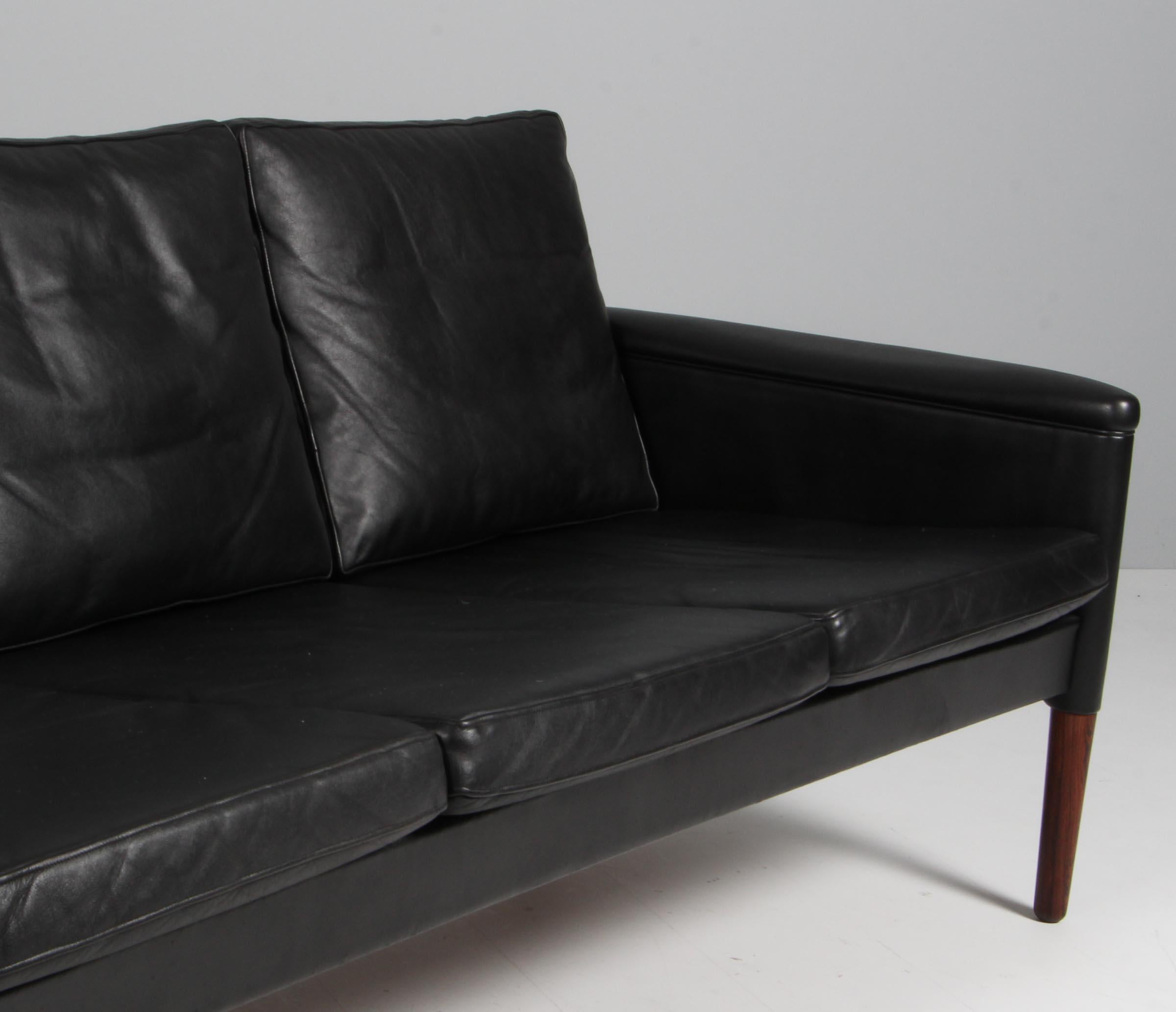 Mid-20th Century Kurt Østervig three seater sofa, original black leather and rosewood. 1960s