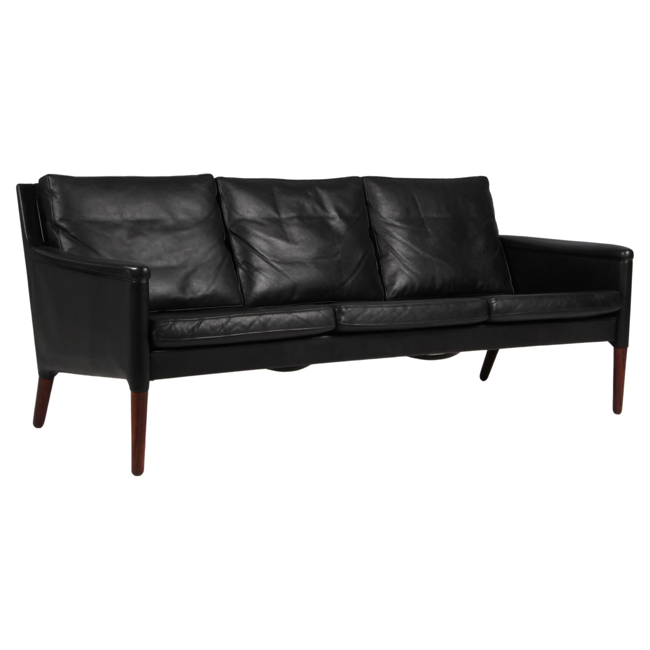 Kurt Østervig three seater sofa, original black leather and rosewood. 1960s For Sale