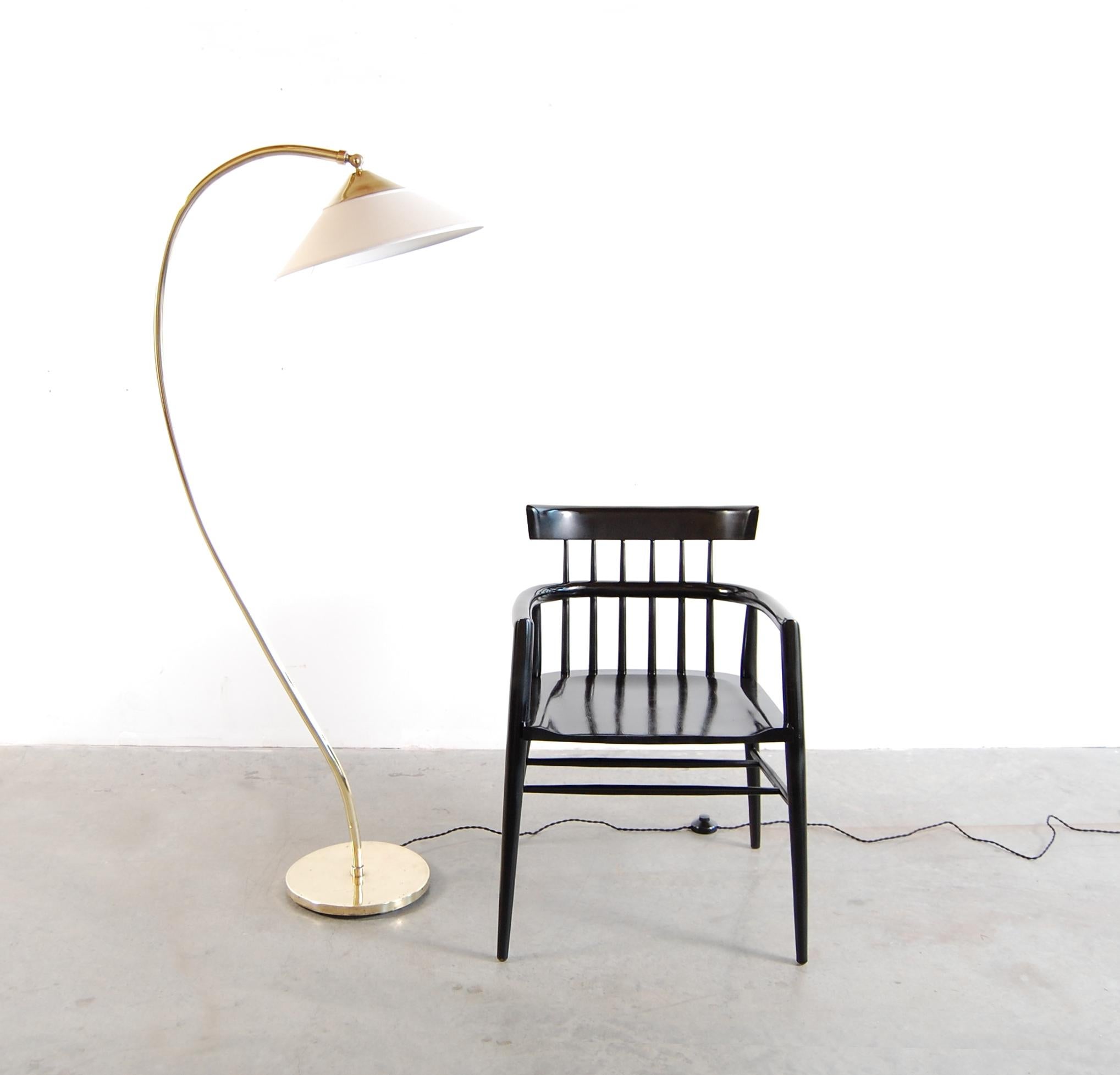 Brass floor lamp with adjustable linen shade, designed by Kurt Versen, circa 1948. New shade, re-wired including new, high quality foot switch.