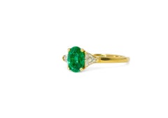 Vintage Kurt Wayne 0.79 Carat Emerald & Diamond 18K Yellow Gold Three-Stone Ring