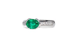 Vintage Kurt Wayne 1.20 Carat Oval Emerald and Diamond Platinum Ring
