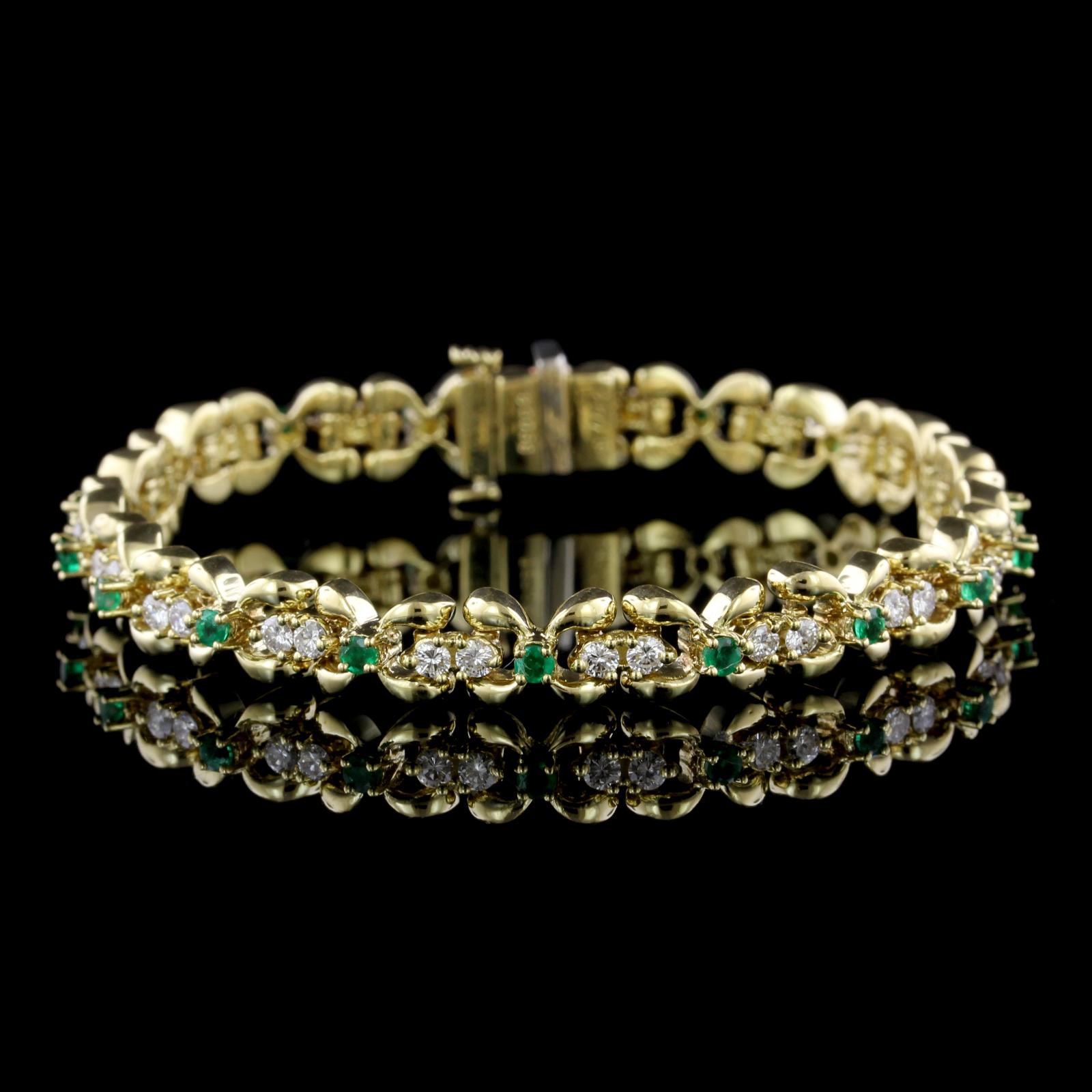 Kurt Wayne 18K Yellow Gold Emerald and Diamond Bracelet. The bracelet is set with 18 round cut emeralds, approx. total wt. .90cts., and 36 full cut diamonds, approx. total wt. 1.44cts., FG color, VS clarity, #80059, length 6 1/2
