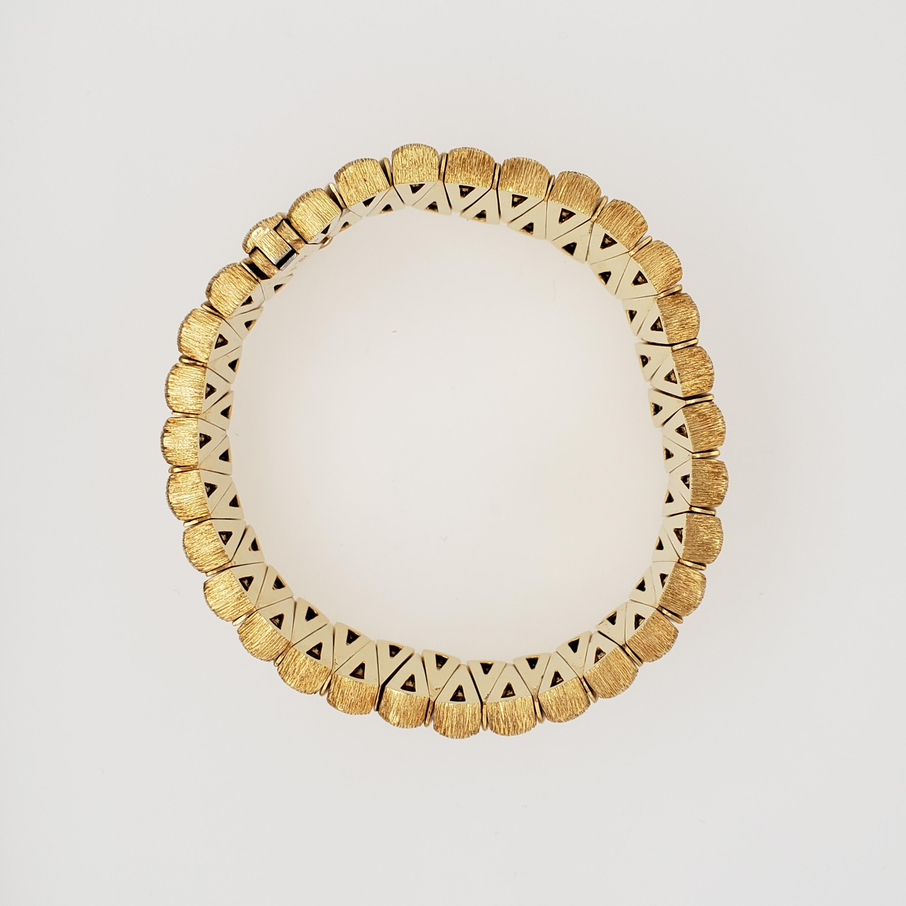 bracelet à maillons en or jaune 18 carats à 2 finitions. Le bracelet mesure 7