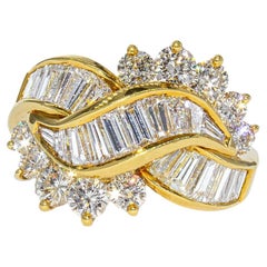 Anillo de cóctel Kurt Wayne con diamantes redondos y baguette de 2,75 quilates totales