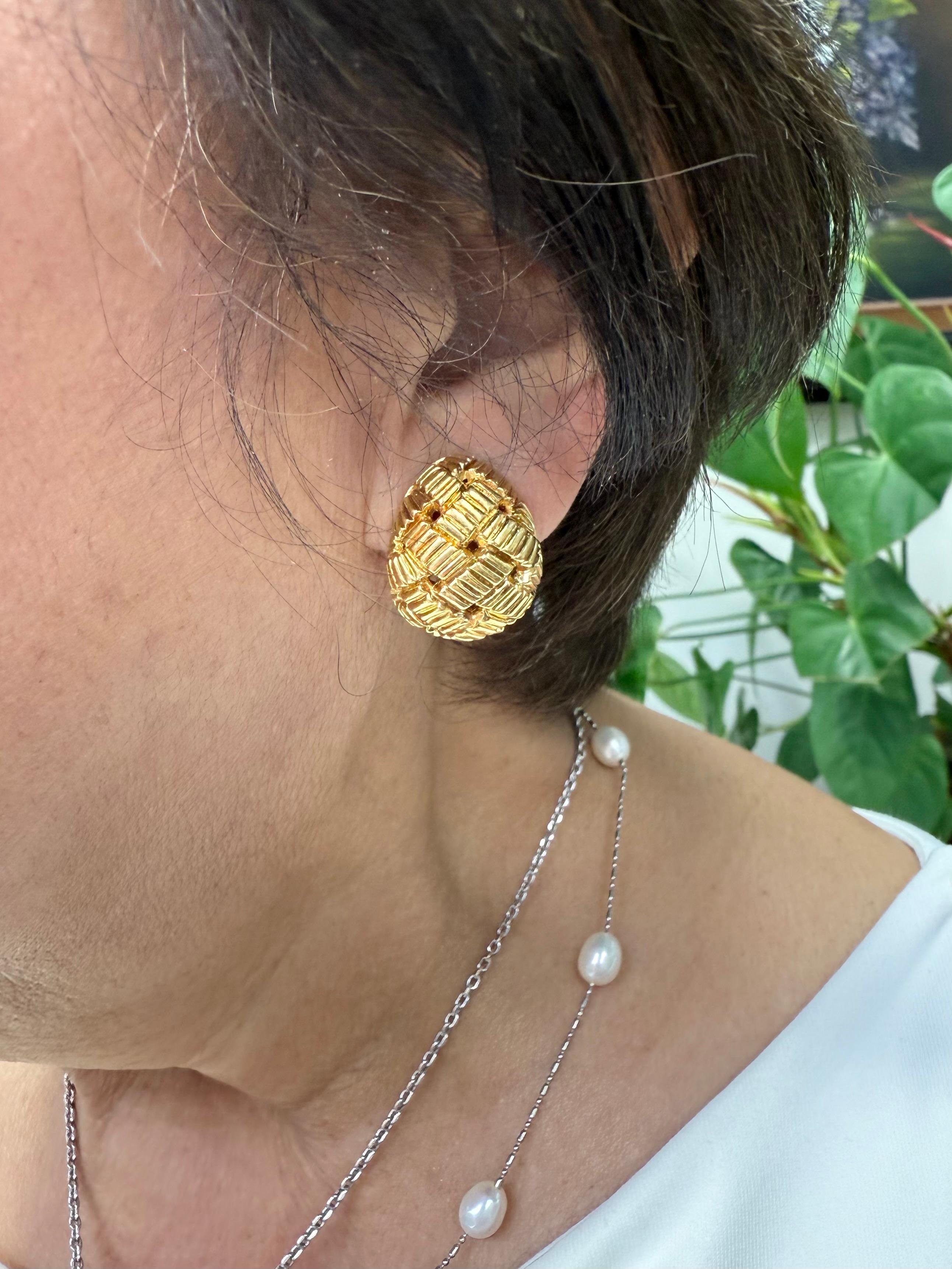 Kurt Wayne Basket Weave 18k Yellow Gold Clip-On Earrings Circa 1970s.

The Kurt Wayne 18k Yellow Gold Clip-On Earrings were made in the 1970s.  Designed as a basket weave pattern on domed pear-shaped clip-on earrings.  Kurt Wayne was known for his