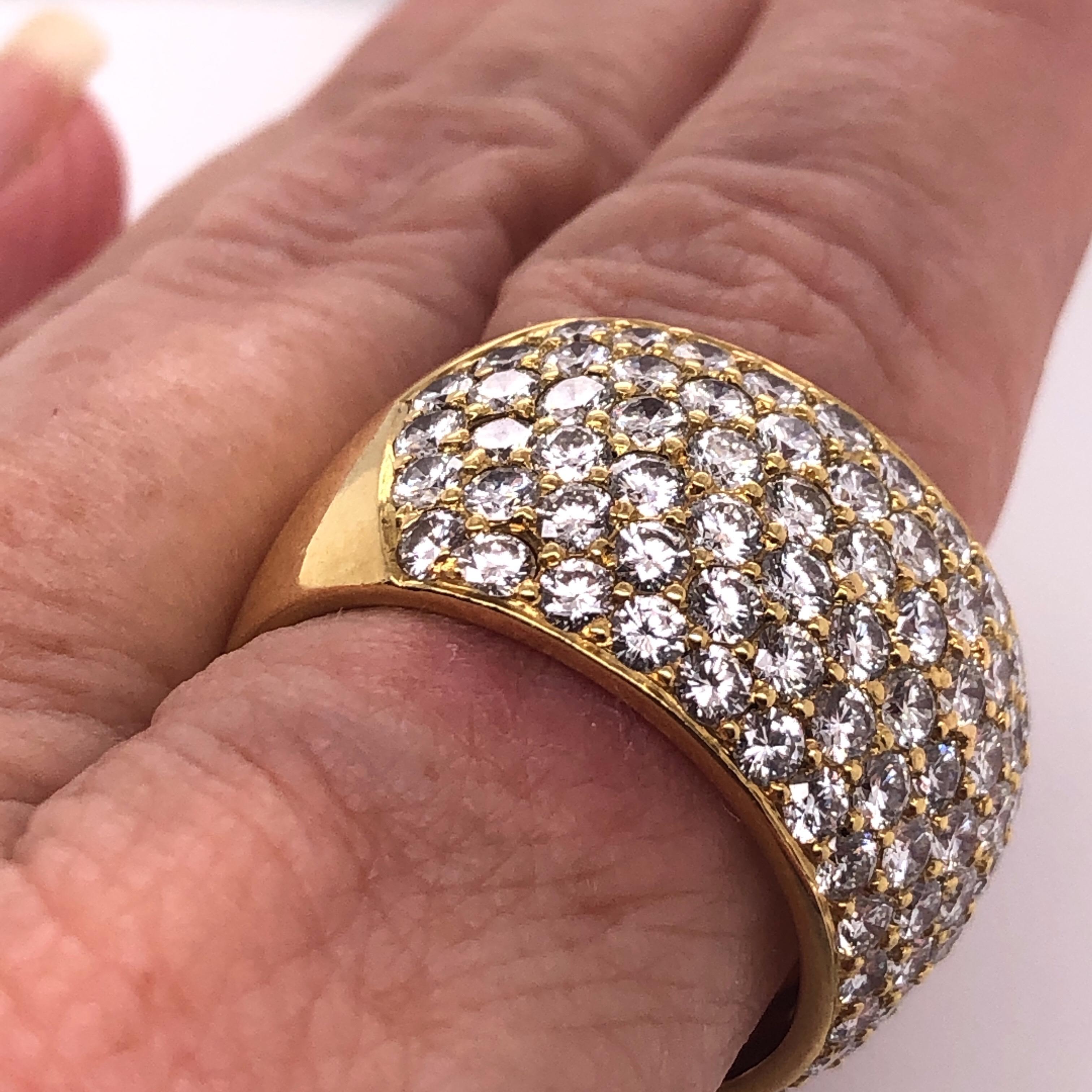 Kurt Wayne 18K Yellow Gold and Pave Diamond 
Approximately 5.5cts of Diamonds on this gorgeous vintage Gold Band. 
14.3 Grams of total weight. 
9.75 size