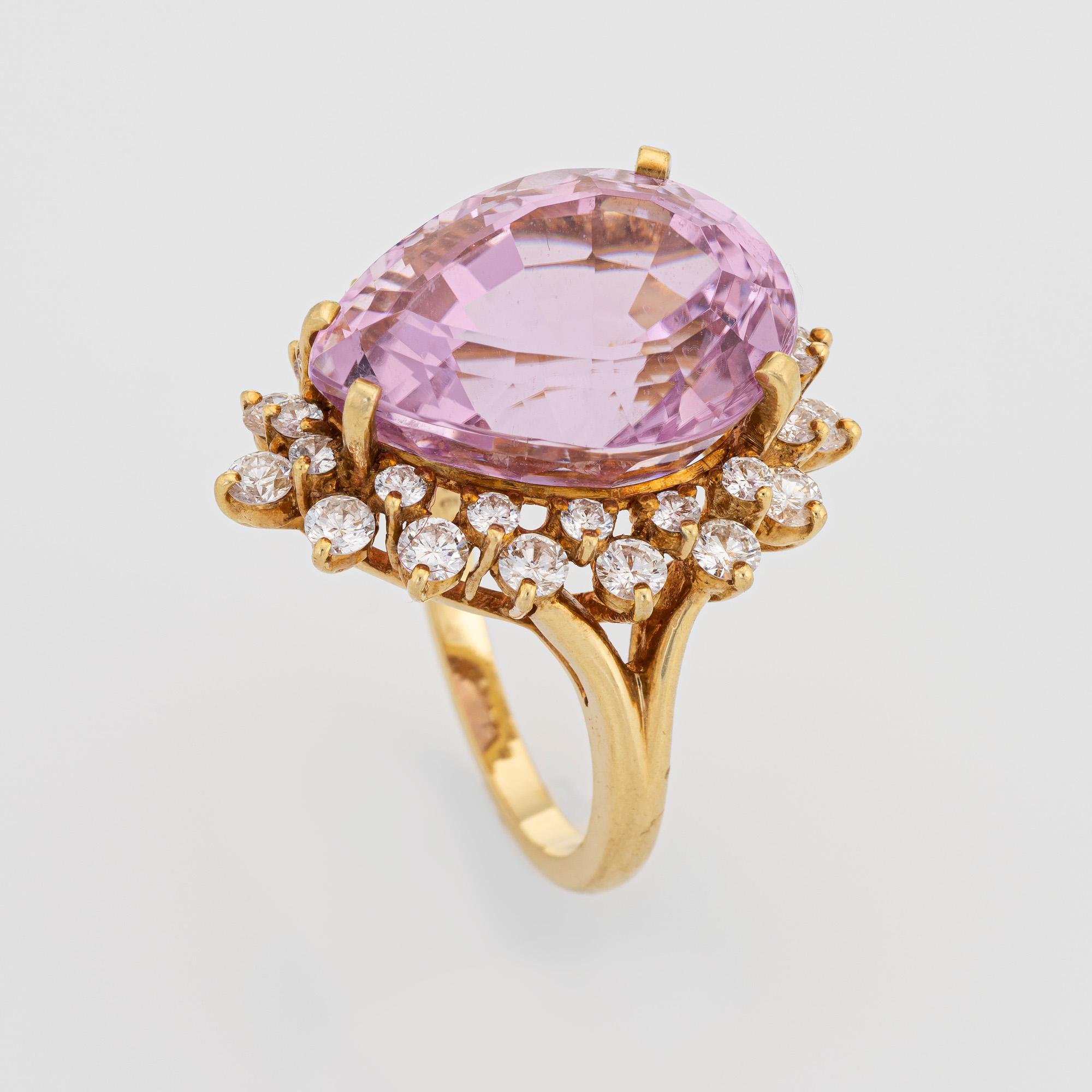 Stylish vintage Kurt Wayne kunzite & diamond ring (circa 1980s) crafted in 14 karat yellow gold. 

Faceted pear cut kunzite measures 20mm x 15mm (estimated at 18.50 carats). 32 diamonds range in size from 0.05 to 0.12 carats. The total diamond