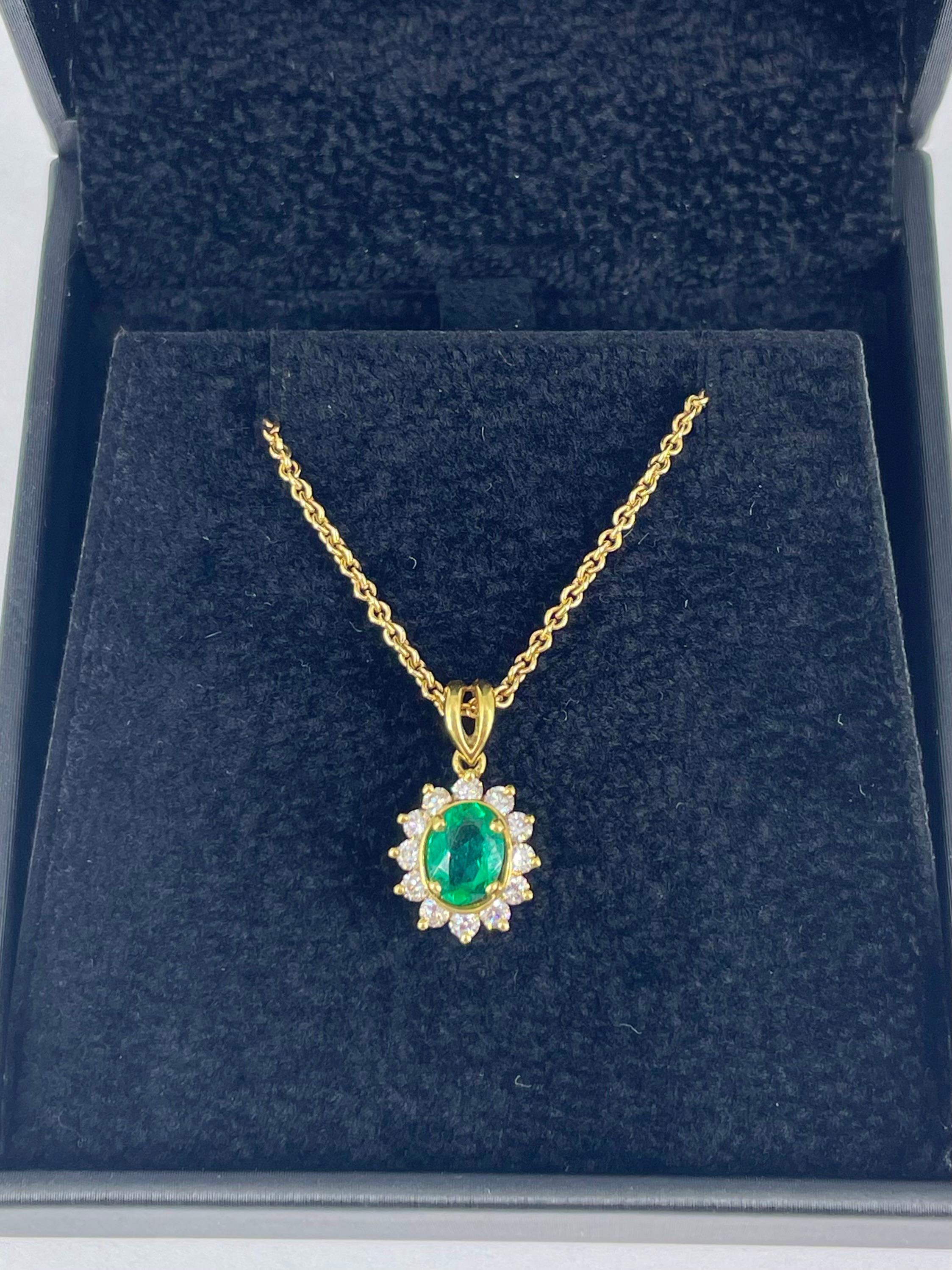 Oval Cut Kurt Wayne Oval Emerald Pendant with Diamond Halo in 18K Yellow Gold For Sale