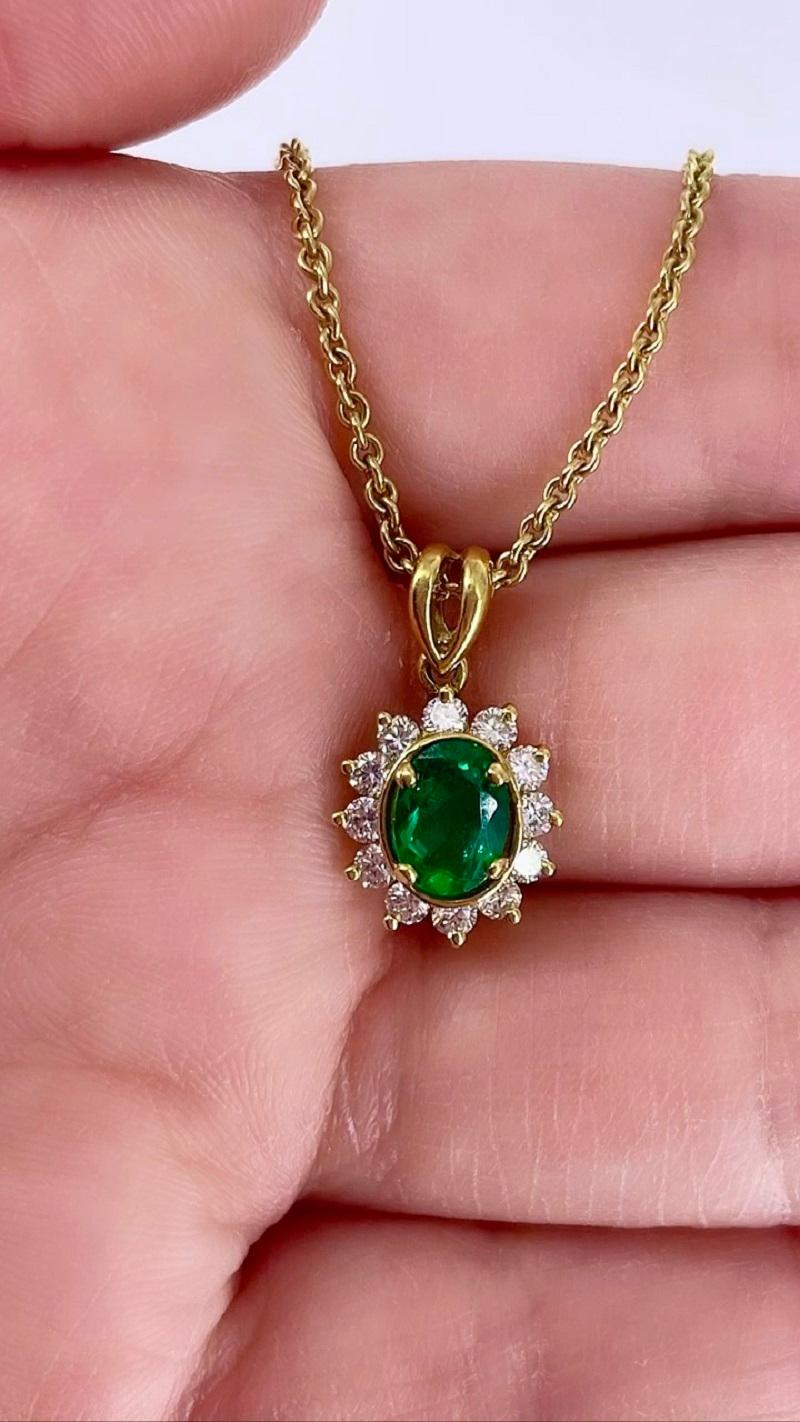 Oval Cut Kurt Wayne Oval Emerald Pendant with Diamond Halo in 18K Yellow Gold For Sale