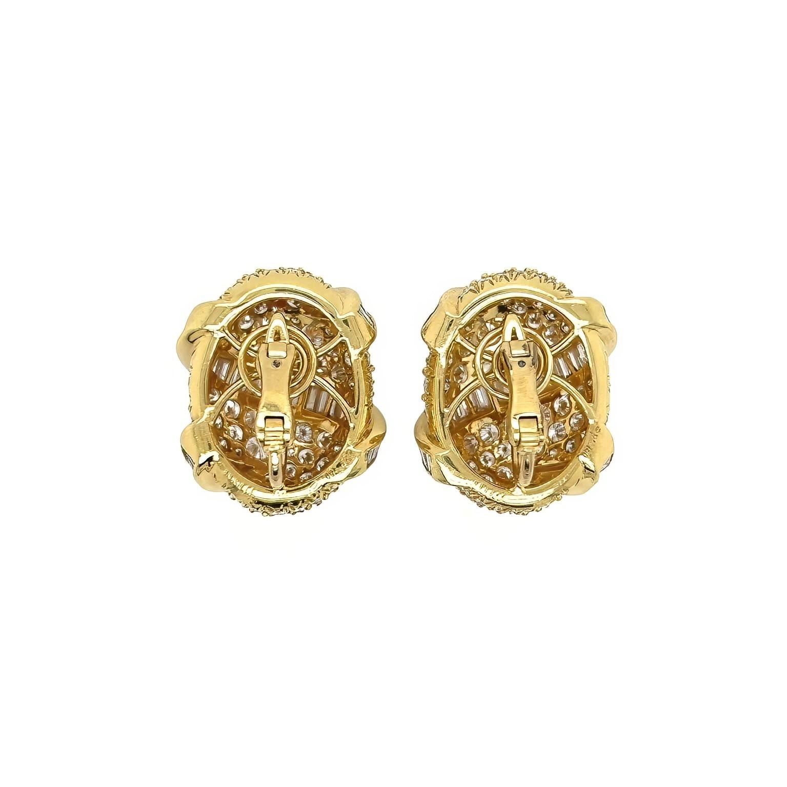 A pair of 18 karat yellow gold and diamond earclips, Kurt Wayne.  Each earclip designed as a puffed oval pave set with approximately 88 round brilliant cut diamonds overlaid with a trompe l'oeil spiral of approximately 37 channel set baguette cut