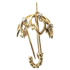 Broche paraguas Kurt Wayne de oro amarillo de 18 quilates con diamantes, 1974