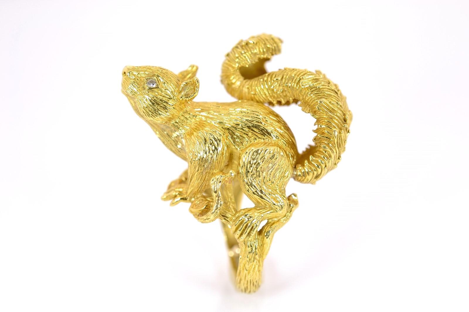 From renown American jeweler Kurt Wayne comes this whimsical and one-of-a-kind Squirrel ring.  Hand-sculpted of rich 18KT gold it charms us with its real life appearance depicting the adorable critter poised for action.  As a touch, the sparkly