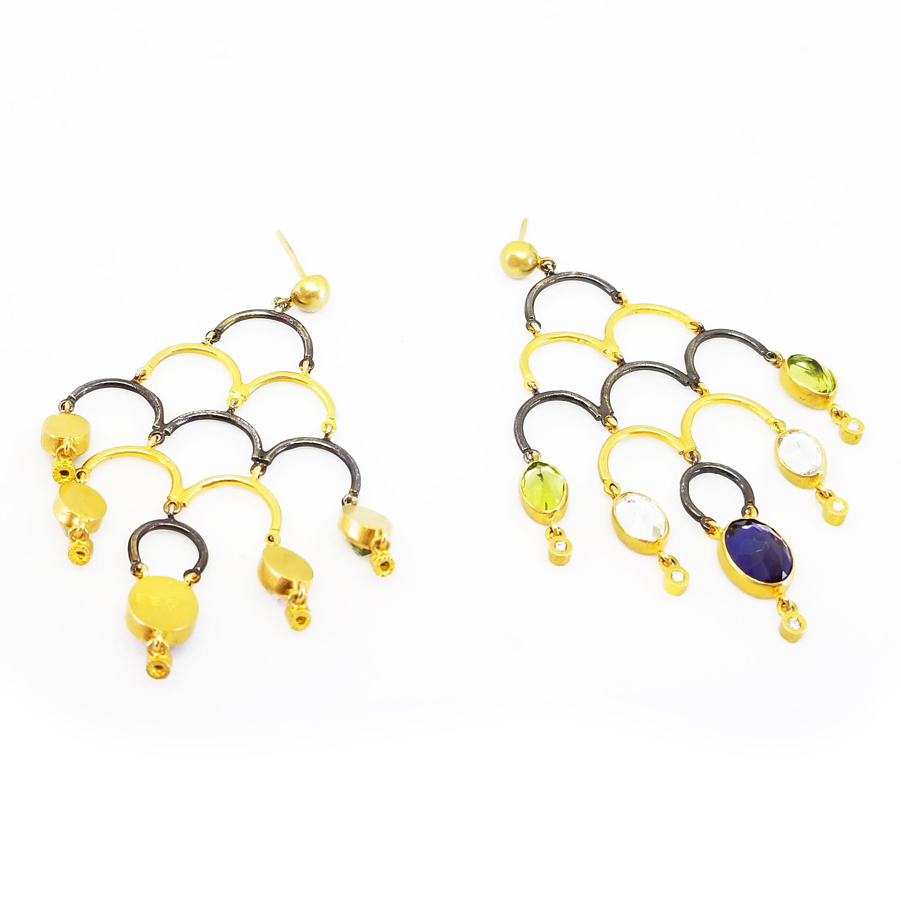 One pair of entirely Hand Crafted Earrings made in Turkey by the Husband and Wife Team at Kurtulan, Naci and Meltem. The Chandelier drop Earrings  feature Oval,  Rose Cut,  Color Gemstones and Round Diamonds. The multi color Gems dangle in