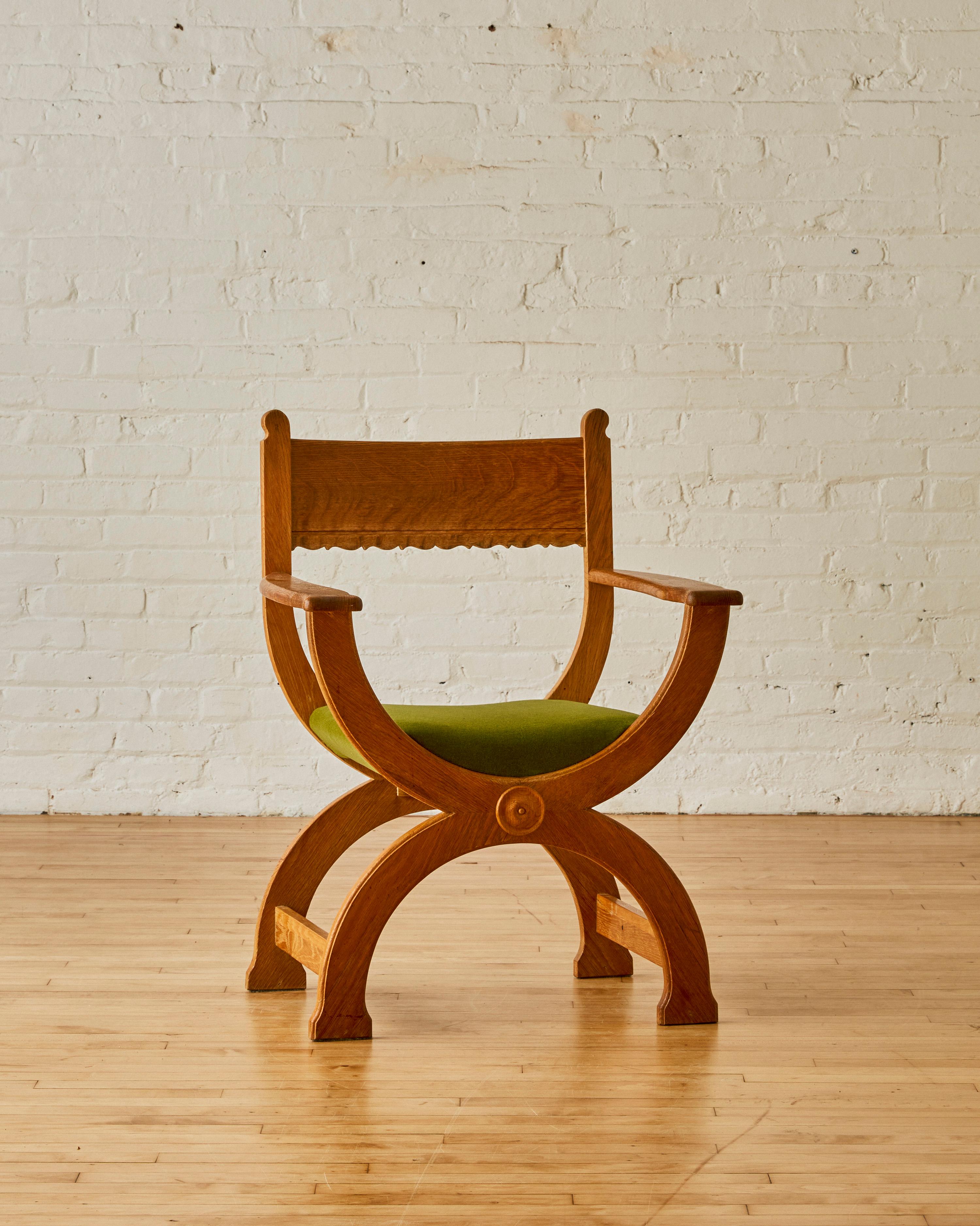 Kurul Armchair by Henry (Henning) Kjaernulf for EG with a Quarter-sawn oak frame, newly reupholstered in green mohair. 


