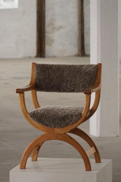 Poltrona "Kurul" in Oak e lana d'agnello, Henning Kjærnulf, metà del secolo scorso, anni '60