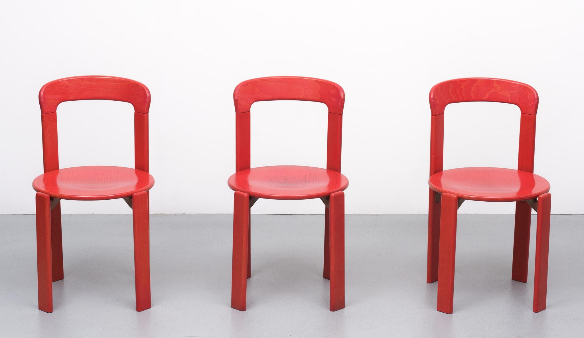 Set Kusch & Co Post Modern chairs. Design Bruno Rey. 1970s Red stained. 
Stackable Not in a perfect condition. There is some damage on the wood, because they are stack able and use. See photo.

    