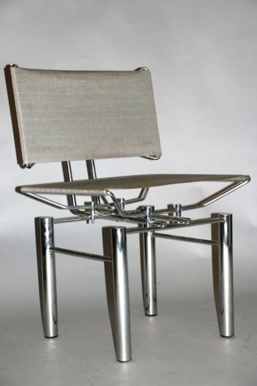 Set of four dining chairs by Kusch & Cp. in chromed-metal and Stainless steel. Designed by Hans Ullrich Bitsch. Germany, 1982. Measures: 21