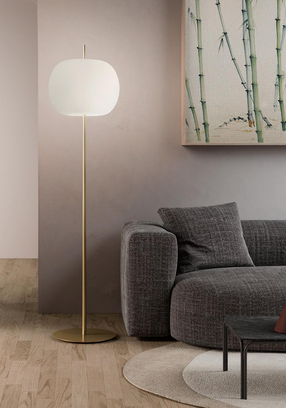 'Kushi XL' opaline glass and brass floor lamp for KDLN.

Executed in mouth-blown double layer opaline glass with a metallic body available in three coating finishes: black, copper and brass. This minimalist yet graceful design features a delicate