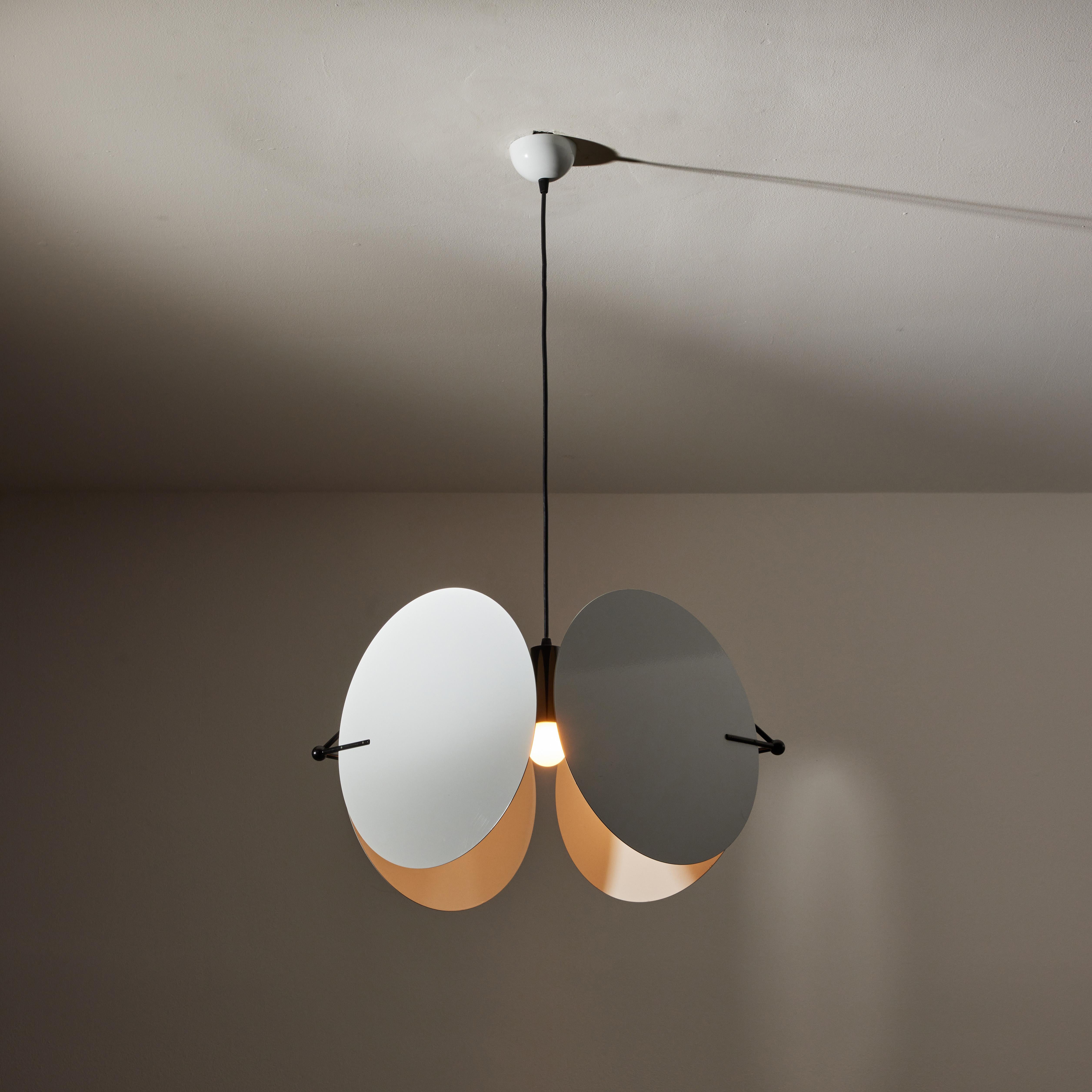 Kuta suspension light by Vico Magistretti for Oluce. Designed and manufactured in Italy, circa 1960's. Enameled metal. Rewired for U.S. standards. Original canopy. We recommend one E27 100w maximum bulb. Bulbs not included.