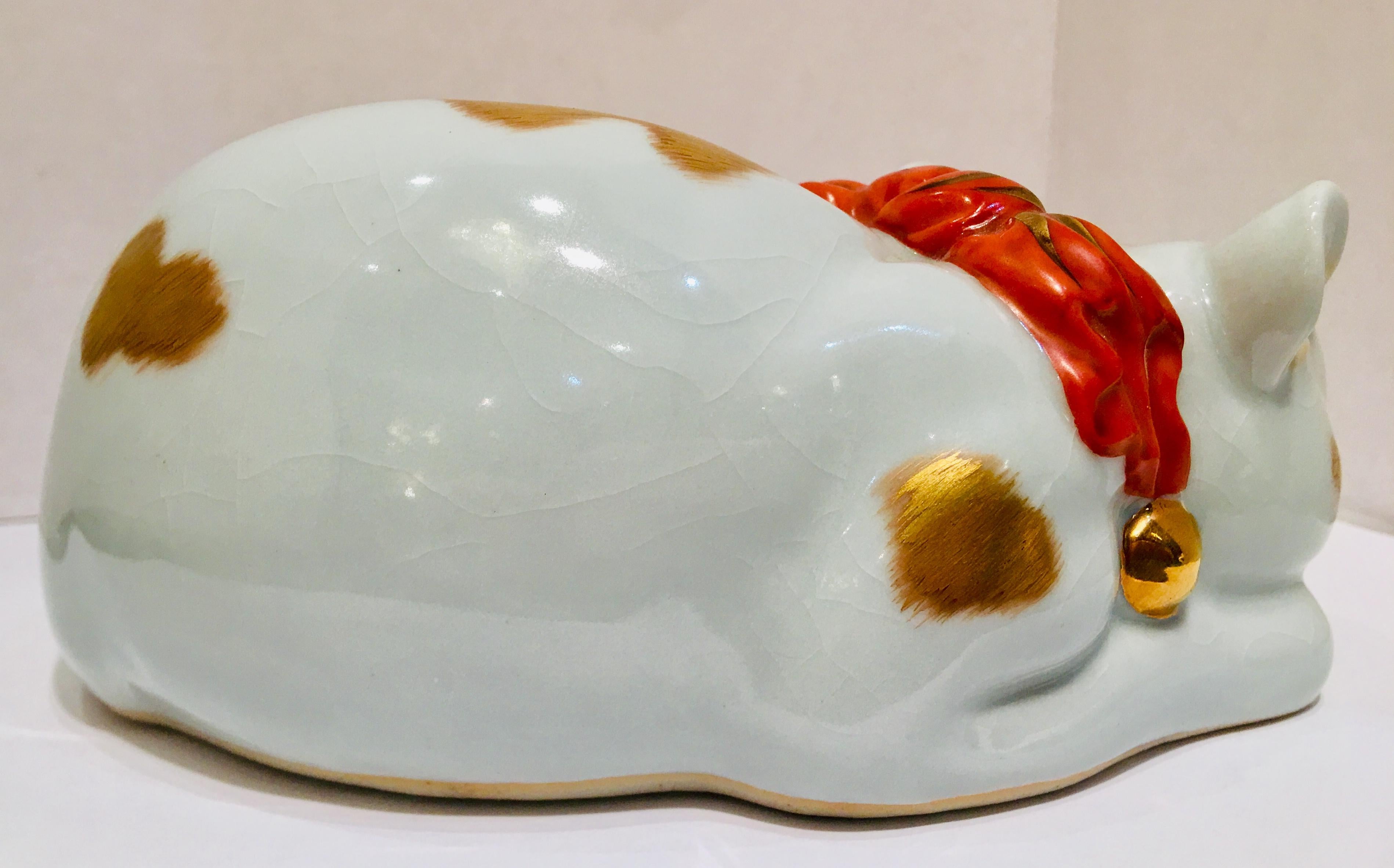 ceramic sleeping cat