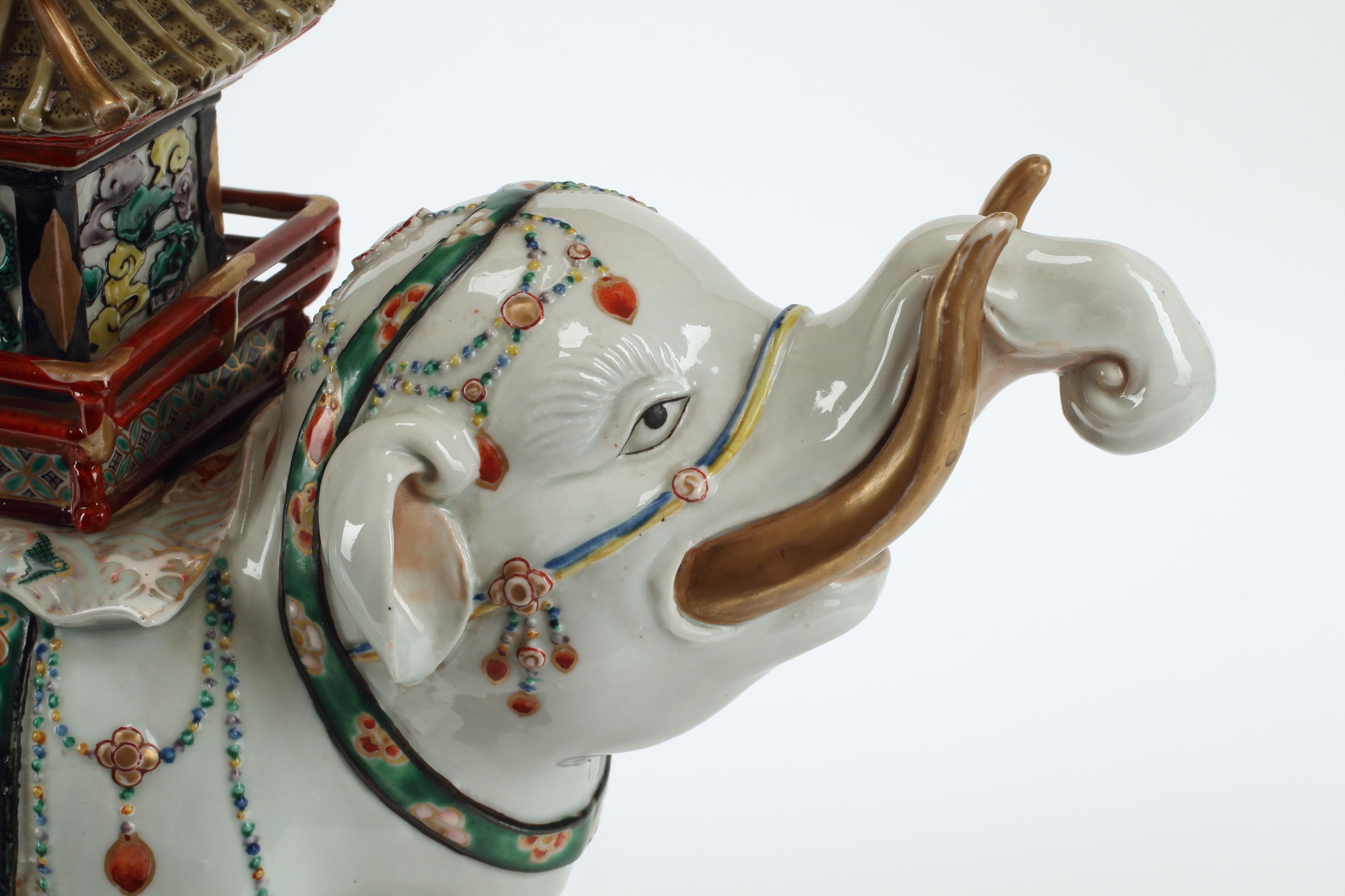 A unique example of kutani polychrome porcelain mounted as a lamp from the Meiji period. An intricately designed porcelain elephant with pagoda is elaborately decorated in various color. The piece features overglazed enamel work typical of Japanese