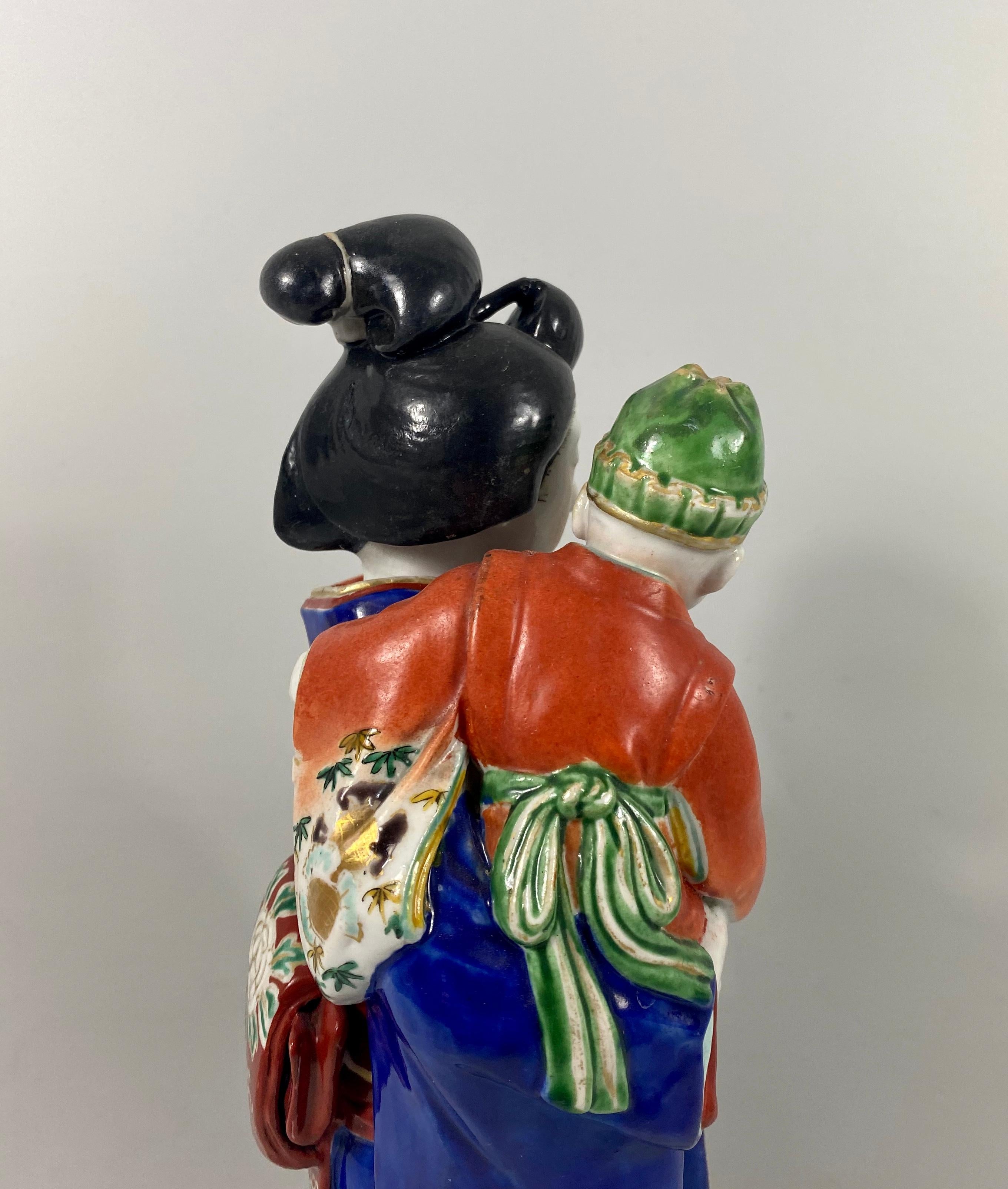 Kutani Porcelain Figure of a Bijin with a Child, Japan, Meiji Period 5