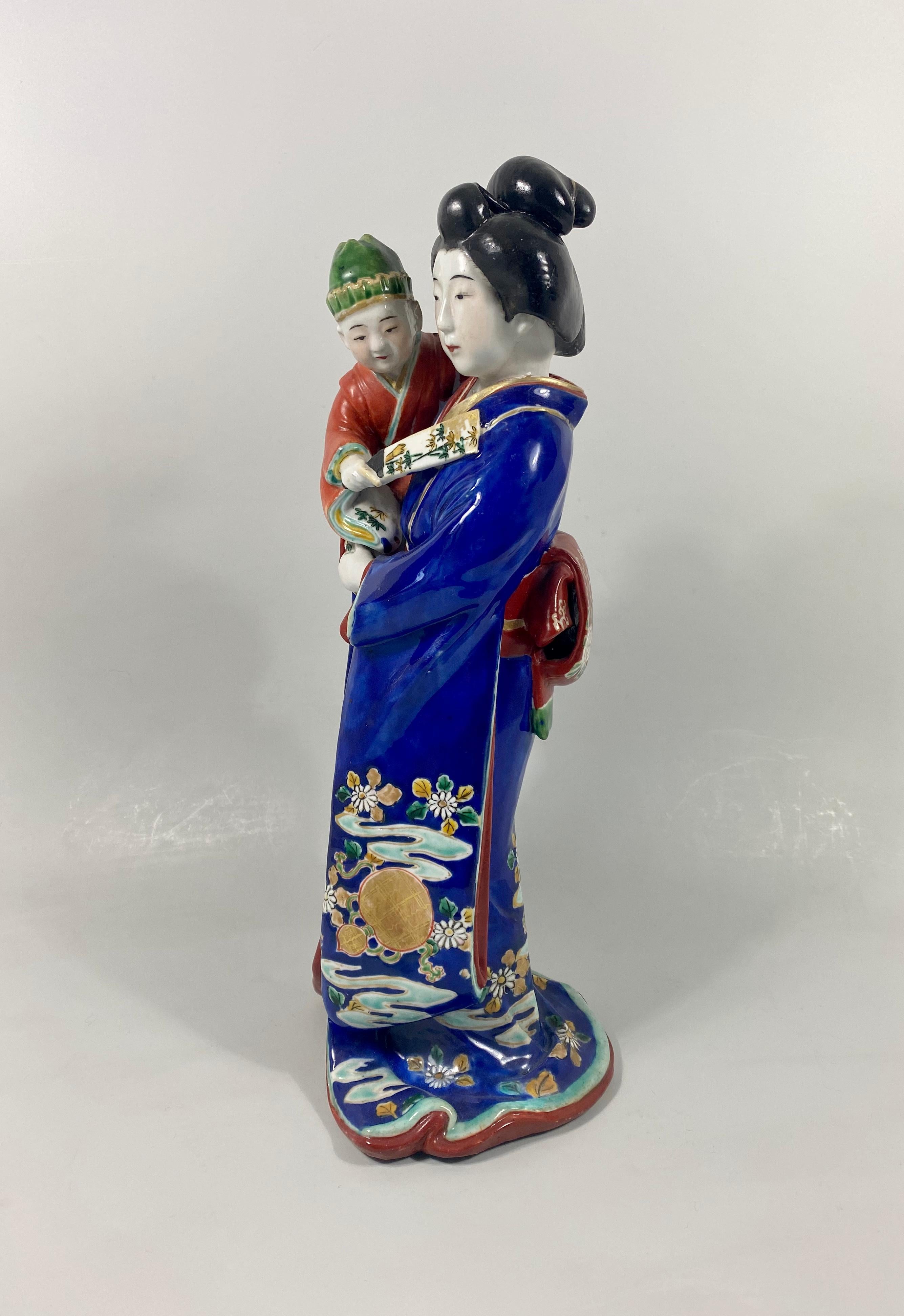 Japanese Kutani Porcelain Figure of a Bijin with a Child, Japan, Meiji Period