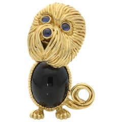 Kutchinsky 18 Carat Gold Dog Brooch with Onyx Body and Sapphire Eyes and Nose