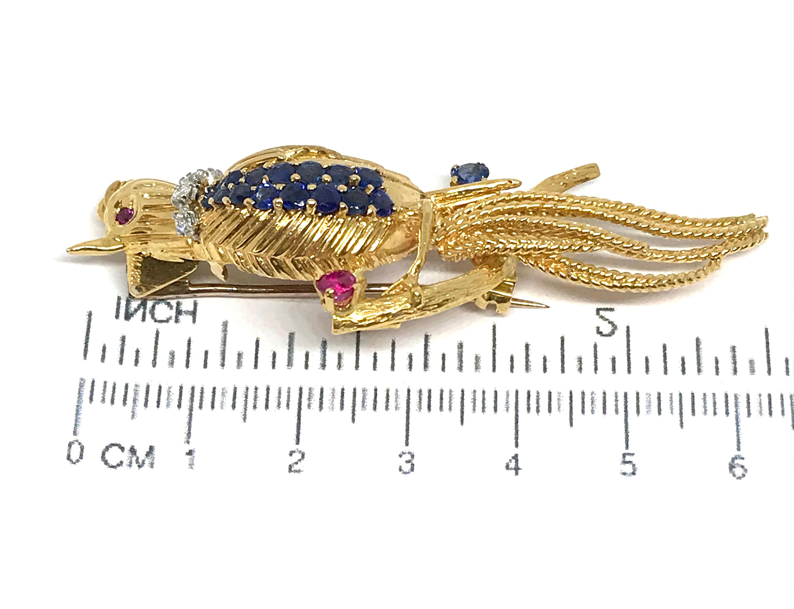 Modernist Kutchinsky 18 Karat Gold, White Diamond, Blue Sapphire and Ruby Bird Brooch