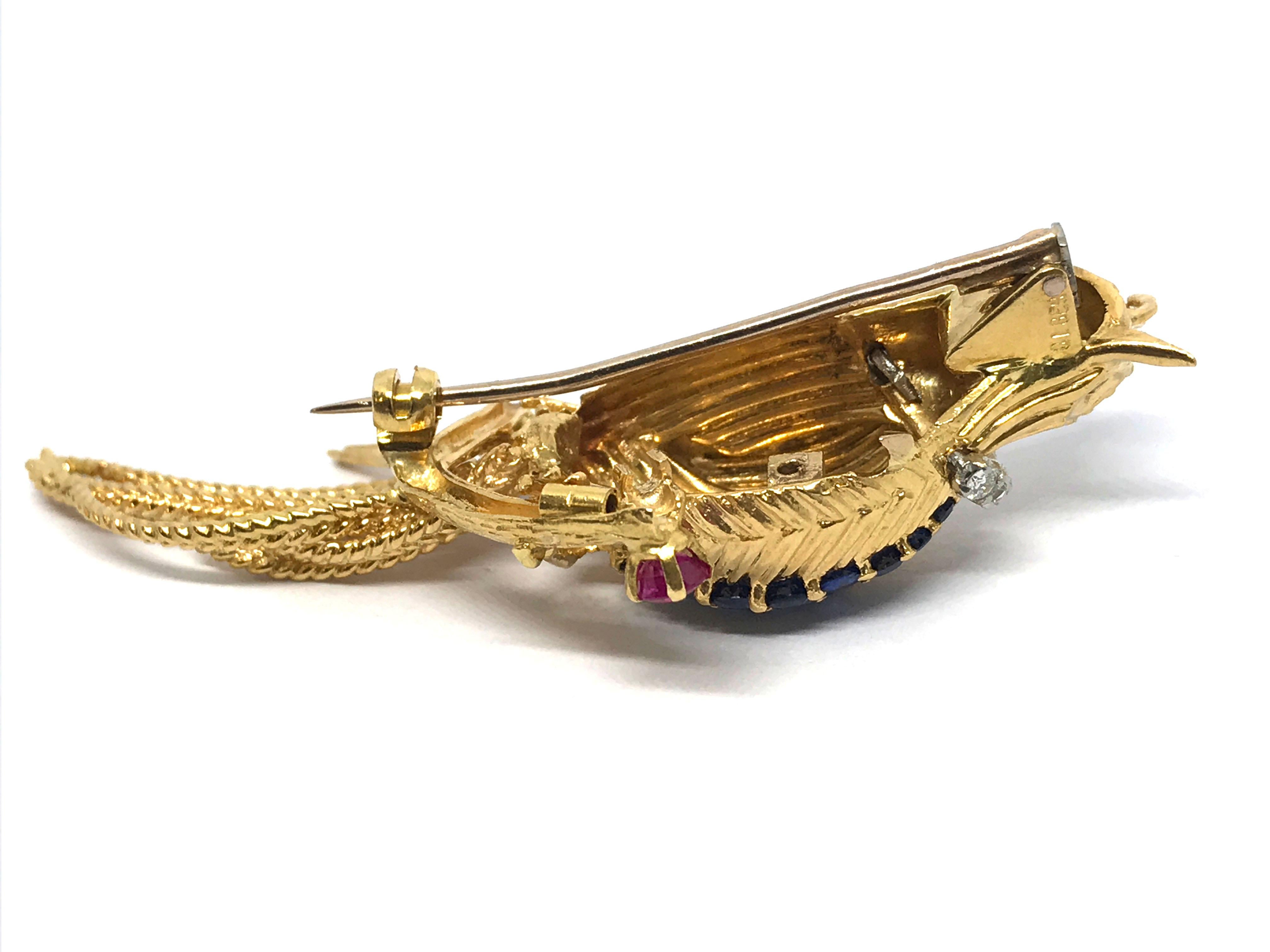 Kutchinsky 18 Karat Gold, White Diamond, Blue Sapphire and Ruby Bird Brooch 1