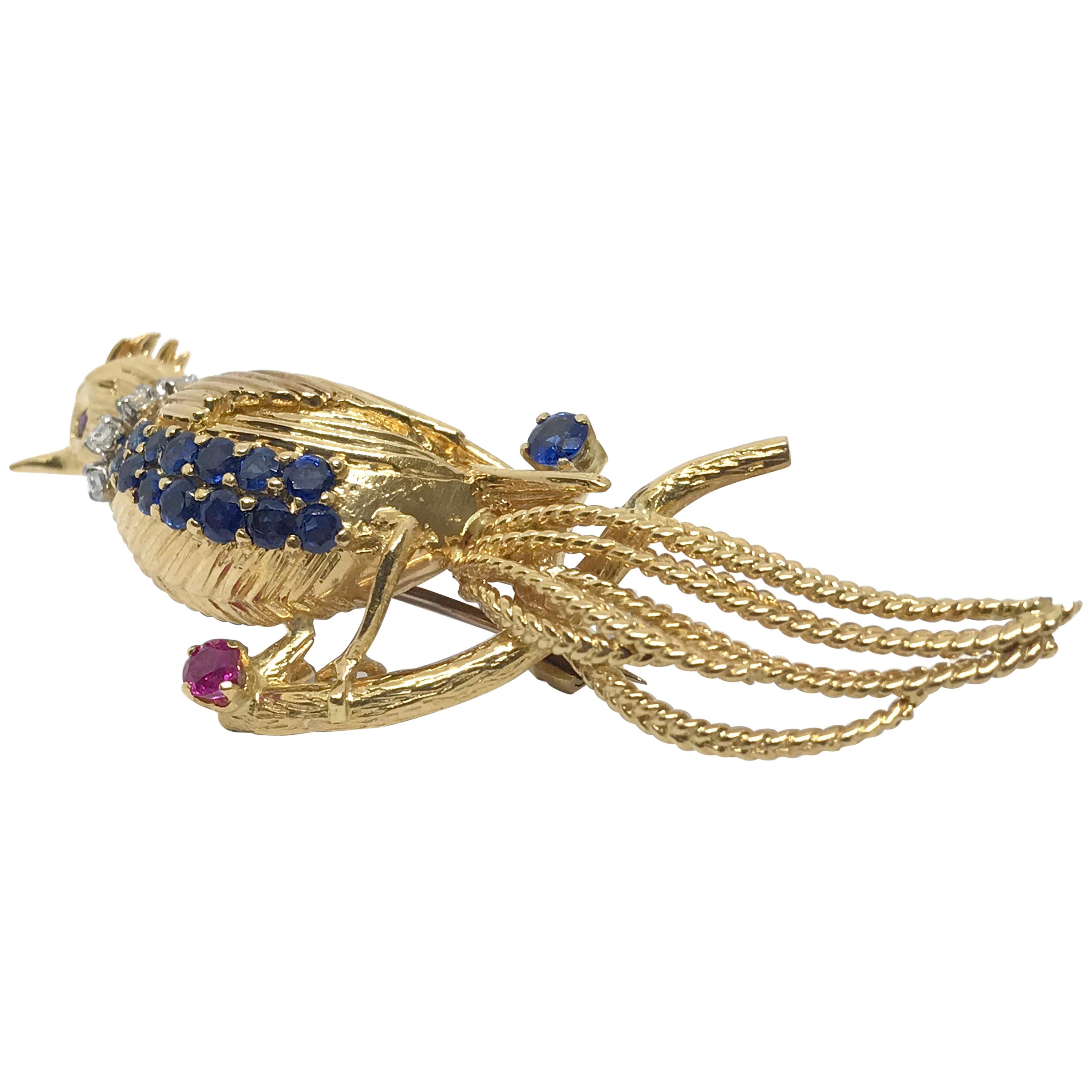 Kutchinsky 18 Karat Gold, White Diamond, Blue Sapphire and Ruby Bird Brooch