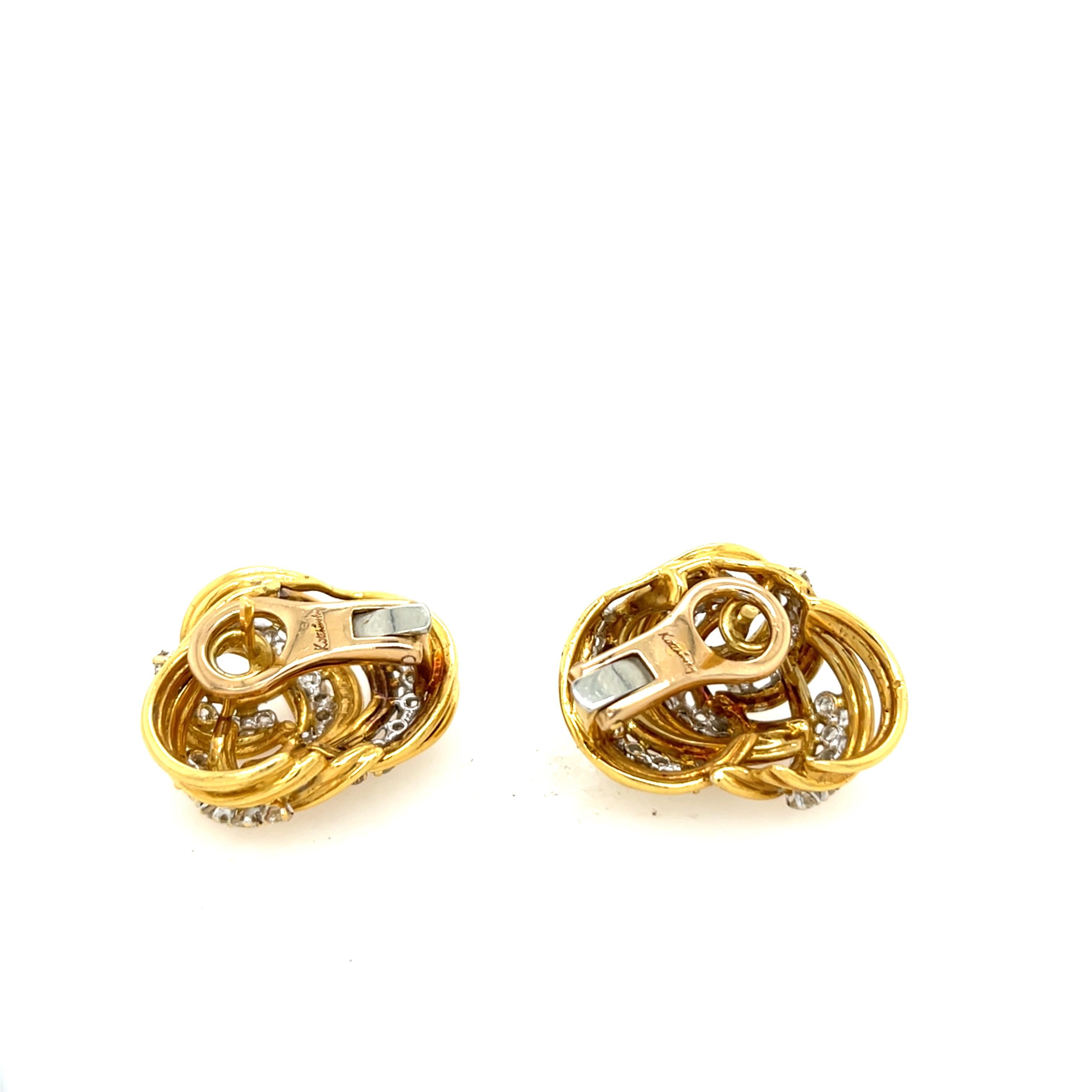 A stunning pair of vintage Kutchinsky earrings crafted in luxurious 18ct yellow gold, featuring a dazzling 1.80ct of brilliant-cut diamonds (G/H colour, VS clarity). 
The elegant cluster design delivers serious sparkle, while the clip-on style