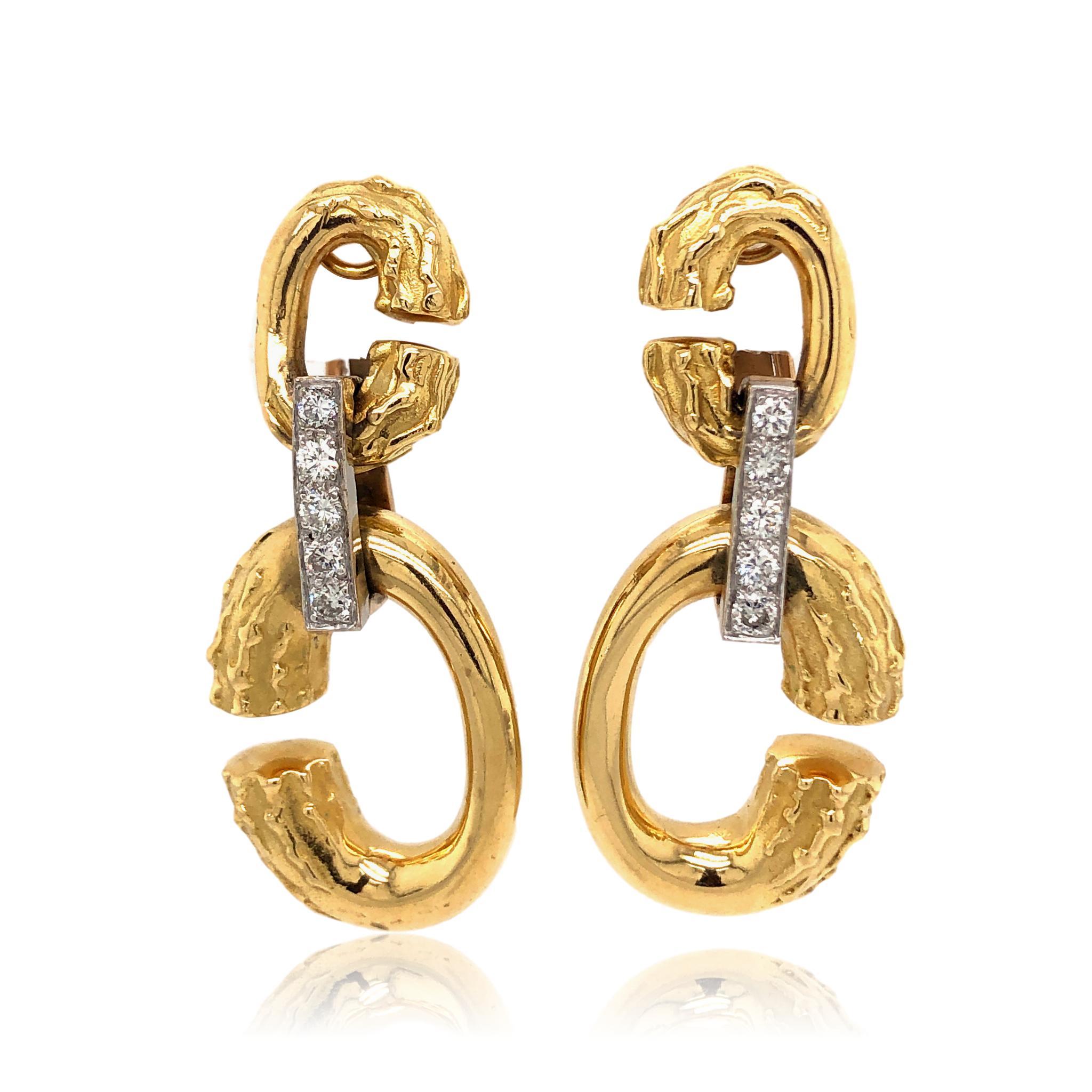 1970's Gold and DIamond drop earclips by Kutchinsky. The 18k yellow gold 1 7/8