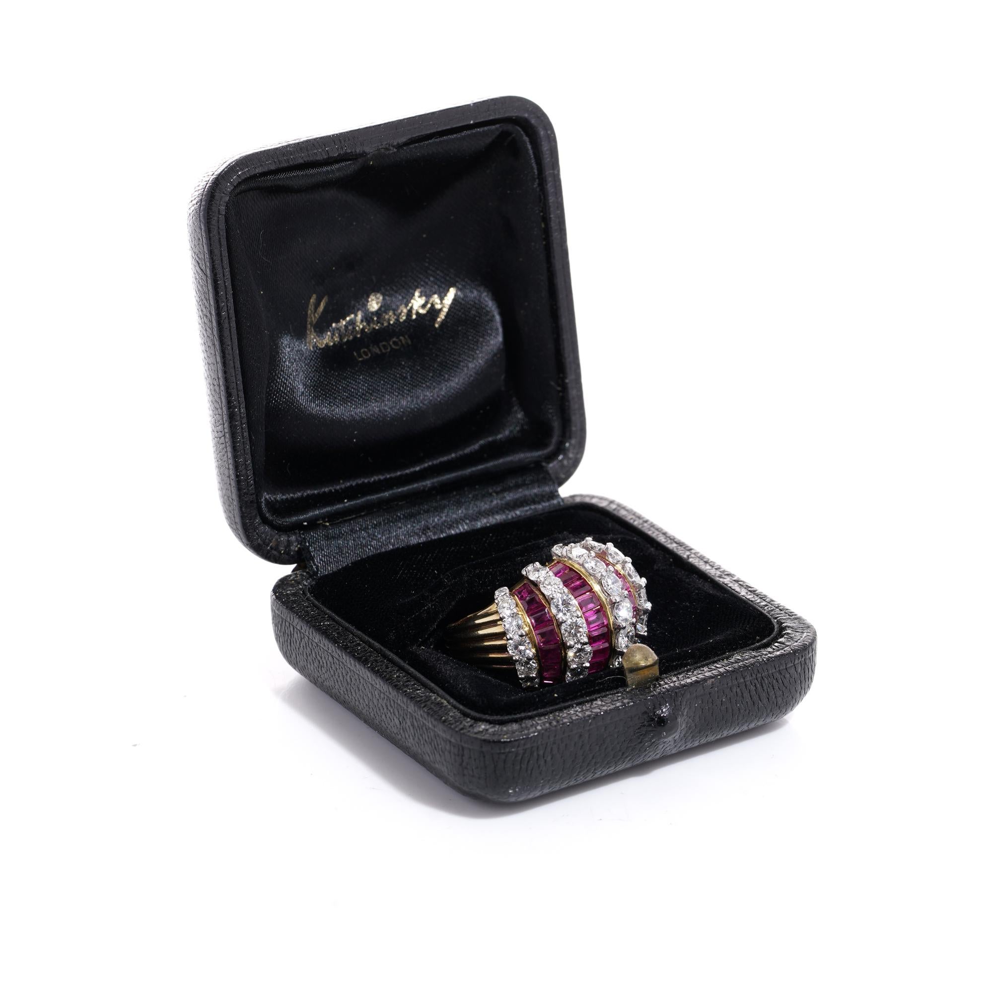 Kutchinsky 18kt. gold ladies' dome ring with 4.00 cts. of diamonds 1.70 cts. of rubies. 
Made in England, 1961
Maker: Kutchinsky
Fully hallmarked. 

Comes in the original box.

Dimensions-
Finger Size (UK) = P 1/2 (US) = 8.25 (EU) = 57 1/2
Ring