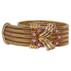 Bracciale da cintura Kutchinsky in oro giallo 18kt, rubini e diamanti, Londra, 1961