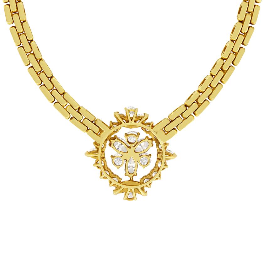 This stunning vintage necklace was crafted by Kutchinsky. It features a total of 5.72 carat diamonds of both marquise and round brilliant cuts. Starting in the centre we have three 0.50 carat marquise diamonds and three 0.30 carat round brilliant