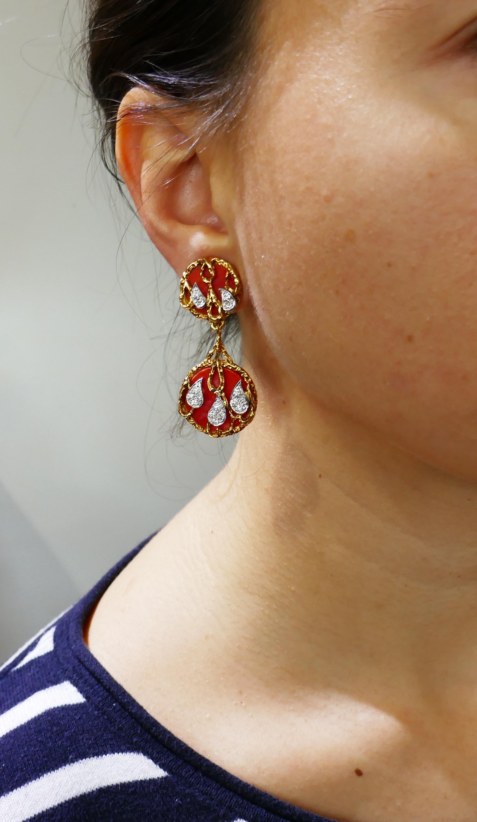 Bold and colorful earrings created by Kutchinsky in the 1970's. Elegant, stylish and wearable, the earrings are a great addition to your jewelry collection. They make a tasteful compliment to a casual or dressy outfit. 
The earrings are made of 18
