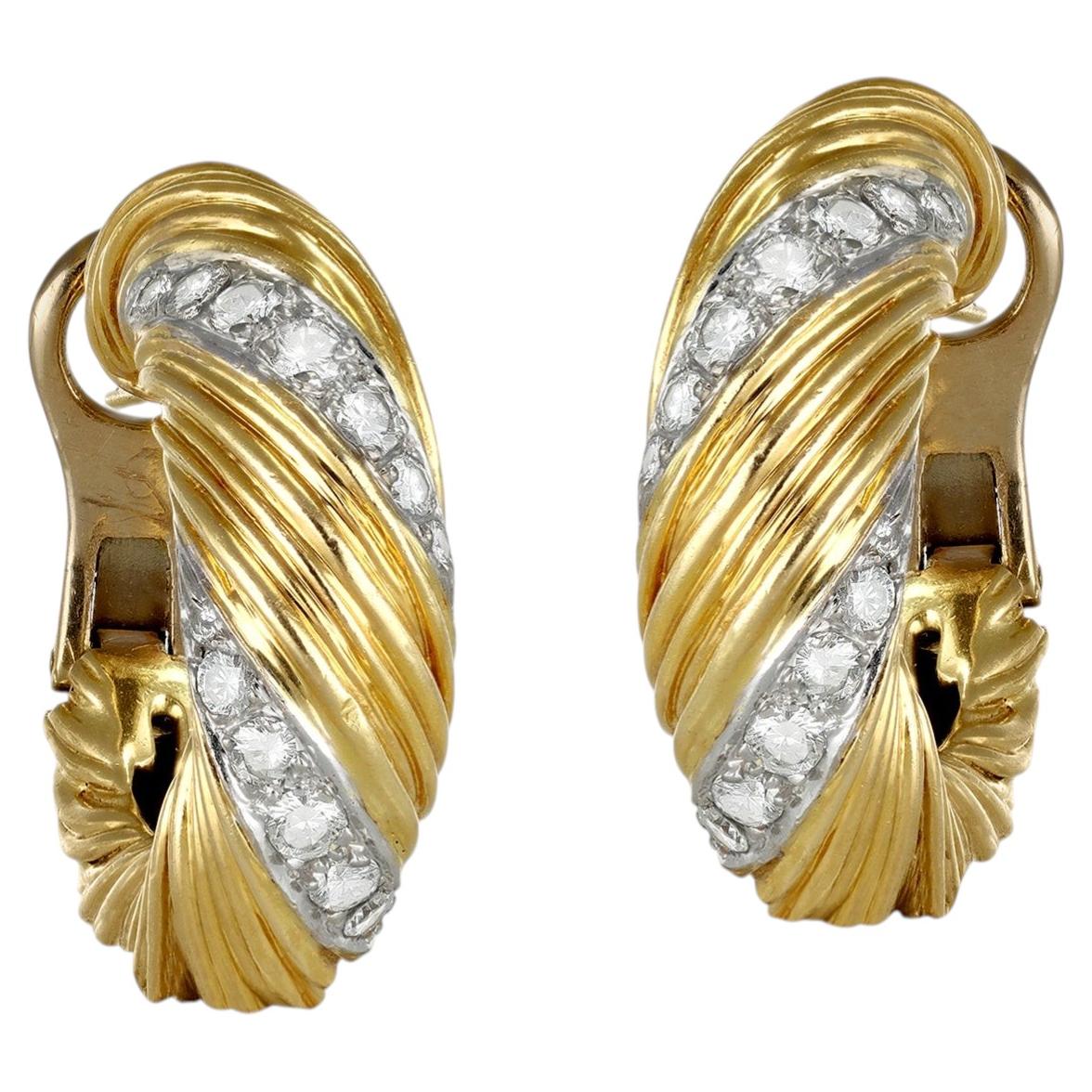 Kutchinsky diamond hoop earrings, English, circa 1970.