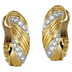 Orecchini a cerchio con diamanti Kutchinsky, inglese, circa 1970.