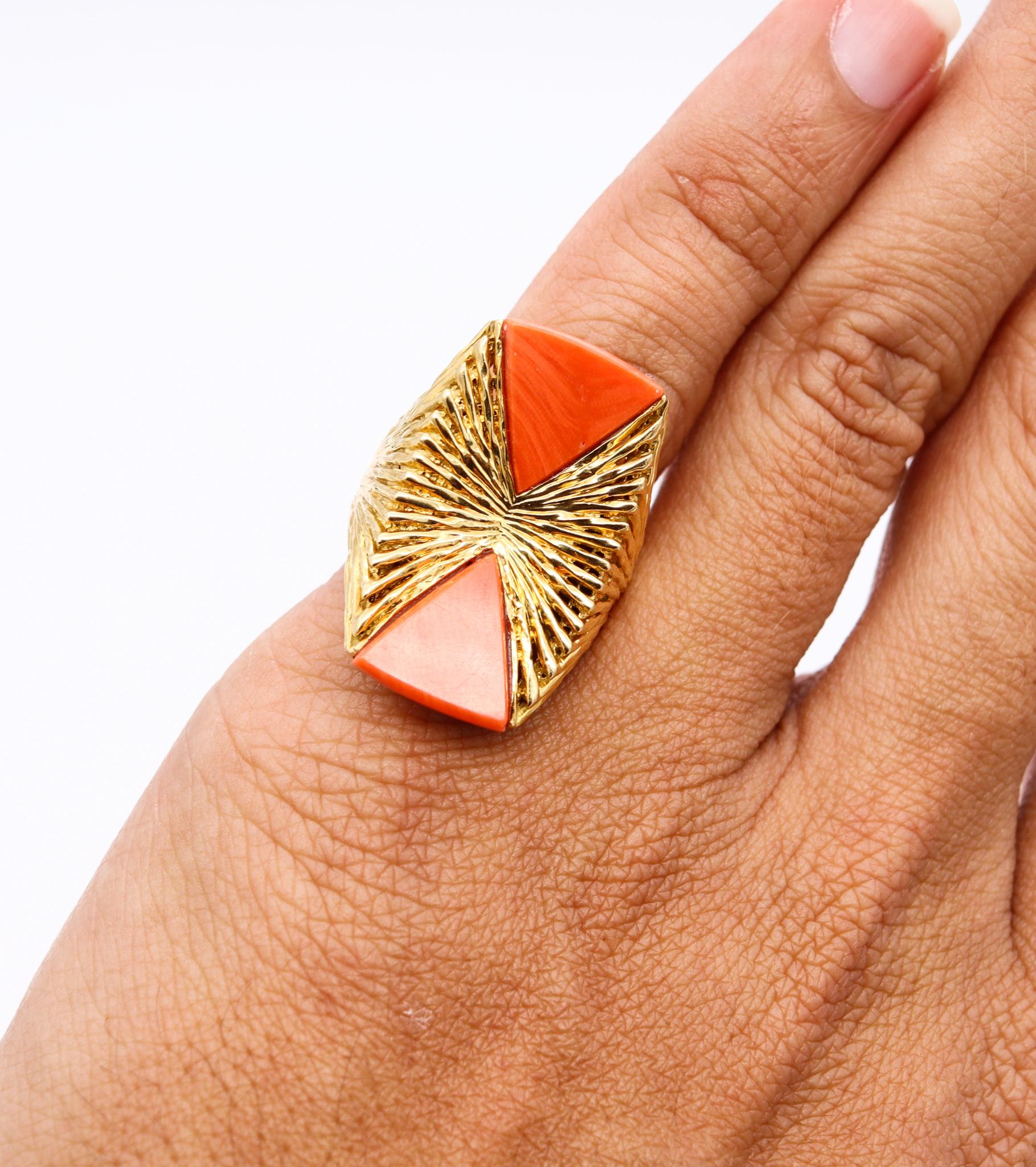 Geometric ring designed by Kutchinsky.

An iconic ring, created by the house of Kutchinsky in London England, back in the 1972. This cocktail ring has been carefully crafted in solid textured yellow gold of 18 karats and embellished with two