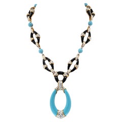 Kutchinsky, collier en platine, or jaune 18 carats, turquoise, onyx et diamants
