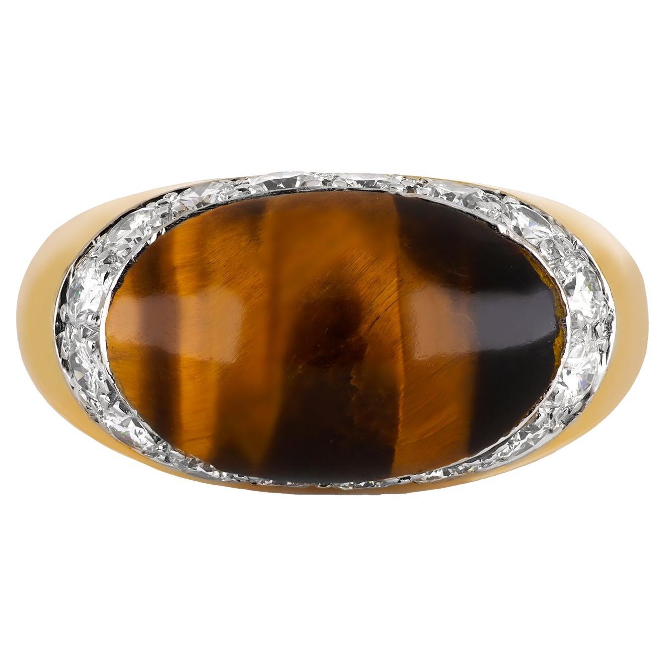 Anello con occhio di tigre e diamante Kutchinsky, inglese, 1972.