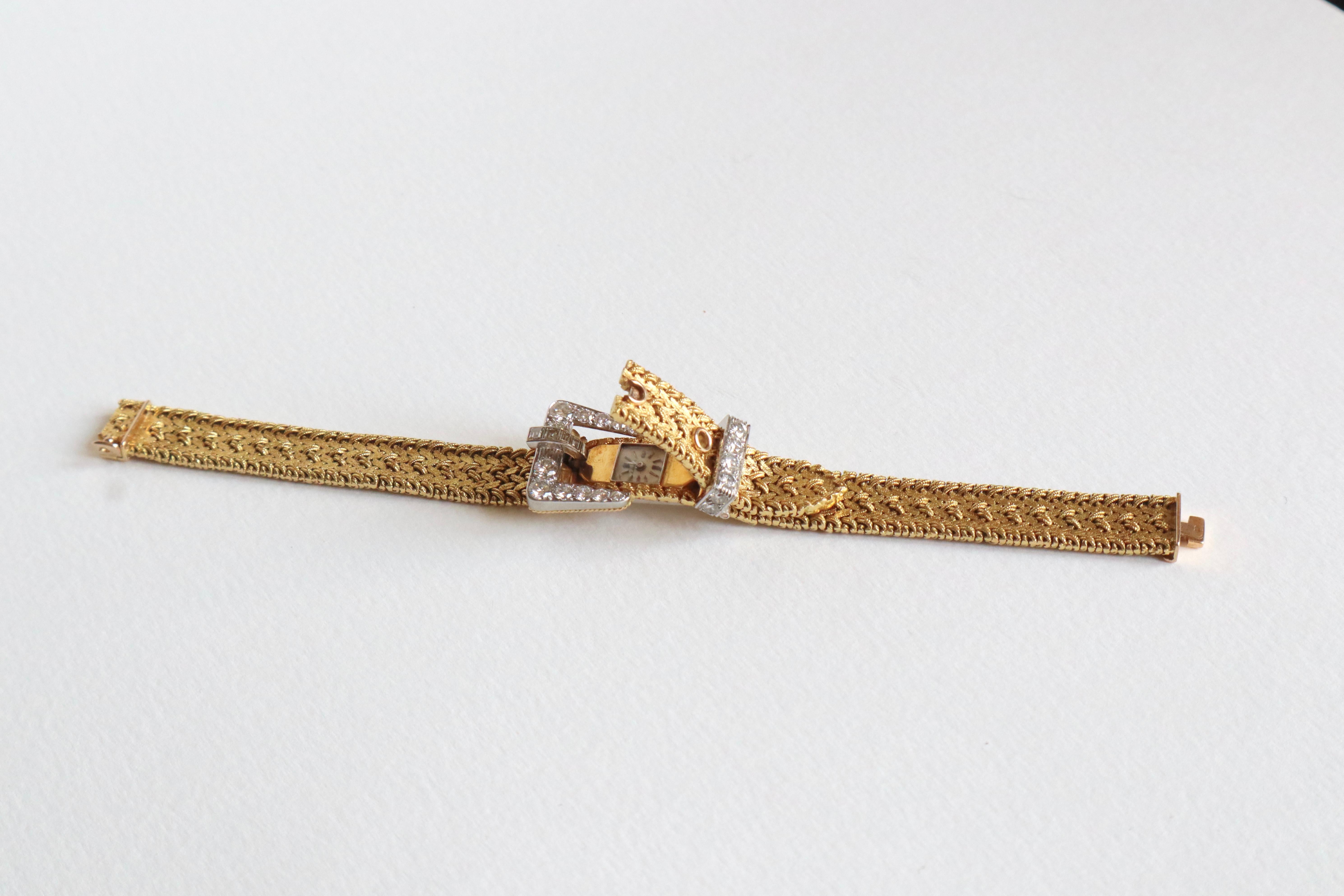 Women's Secret Bracelet watch in 18k yellow Gold and approx. 3 Carat Diamonds from KUTCHINSKY.
Mechanical Watch
Length of the Watch: 18 cm
Width of the Bracelet: 12 mm Weight: 50,6 g
Width of the Diamond Dial at the Widest: 22 mm