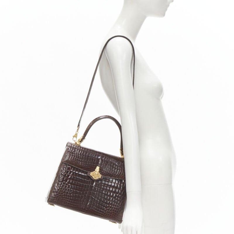 KWANPEN brown polished gold scaled leather hardware crossbody satchel bag
Reference: ANWU/A00015
Brand: Kwanpen
Material: Leather
Color: Brown
Pattern: Solid
Closure: Turnlock
Lining:  Leather
Extra Details: Polished scaled leather. Gold-tone